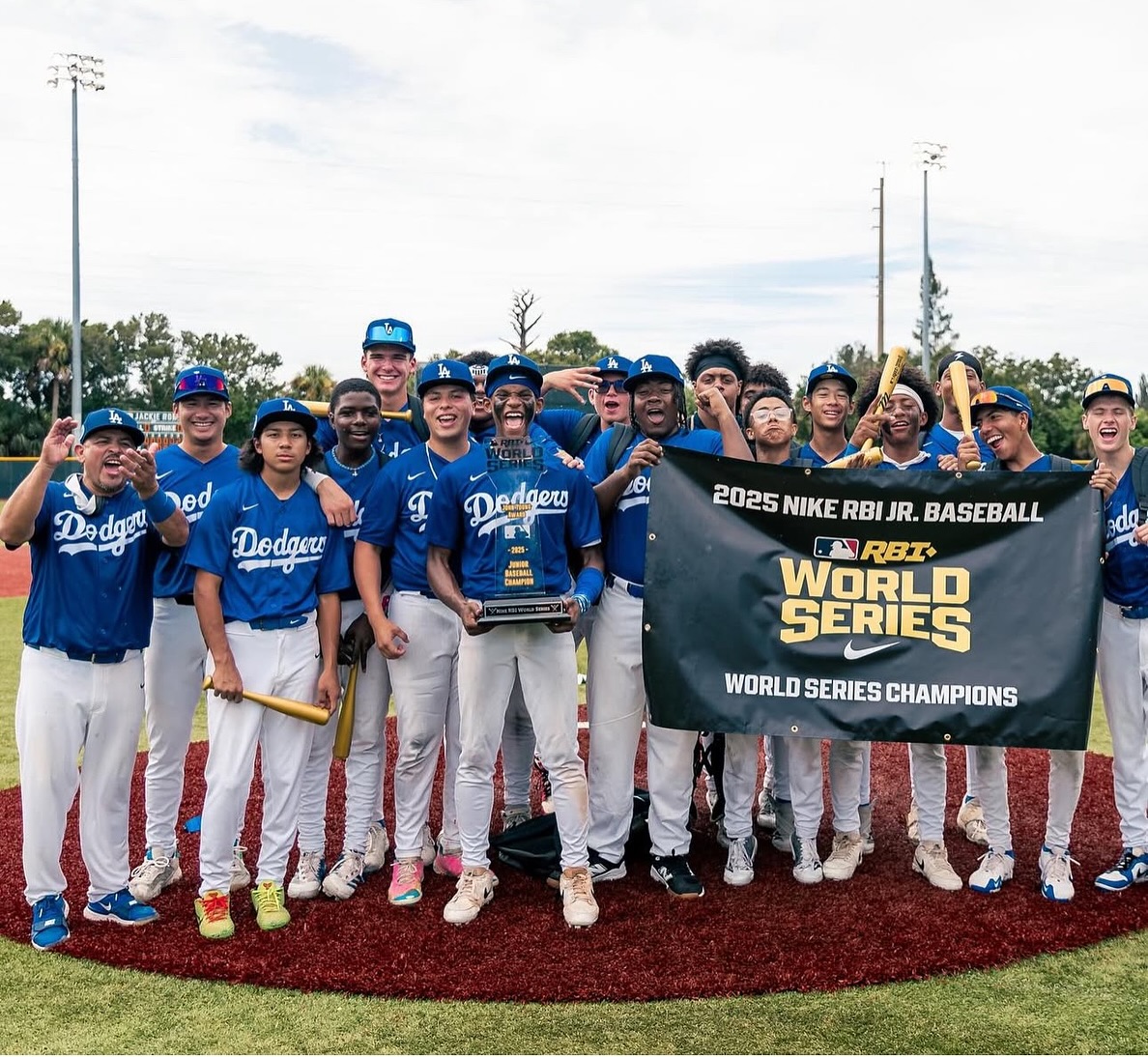 The Junior Dodgers Dreamteam did it — World Series Champions! 🏆💙
Not only did they win the Nike RBI World Series, but they went undefeated through both the Regionals and the Series, racking up an incredible TEN straight wins!
Trevor was a key force behind the team’s success, striking out 9 batters, allowing just 2 walks, and giving up zero earned runs. Announcers called him one of the most talented pitchers on the team.
At the plate, he didn’t just lead his team — he led the entire series — hitting .417 AVG, .611 OBP, and 1.111 OPS.
We are so unbelievably proud of him, thrilled to have him home, and excited to see what the rest of the year holds! ❤️⚾💙