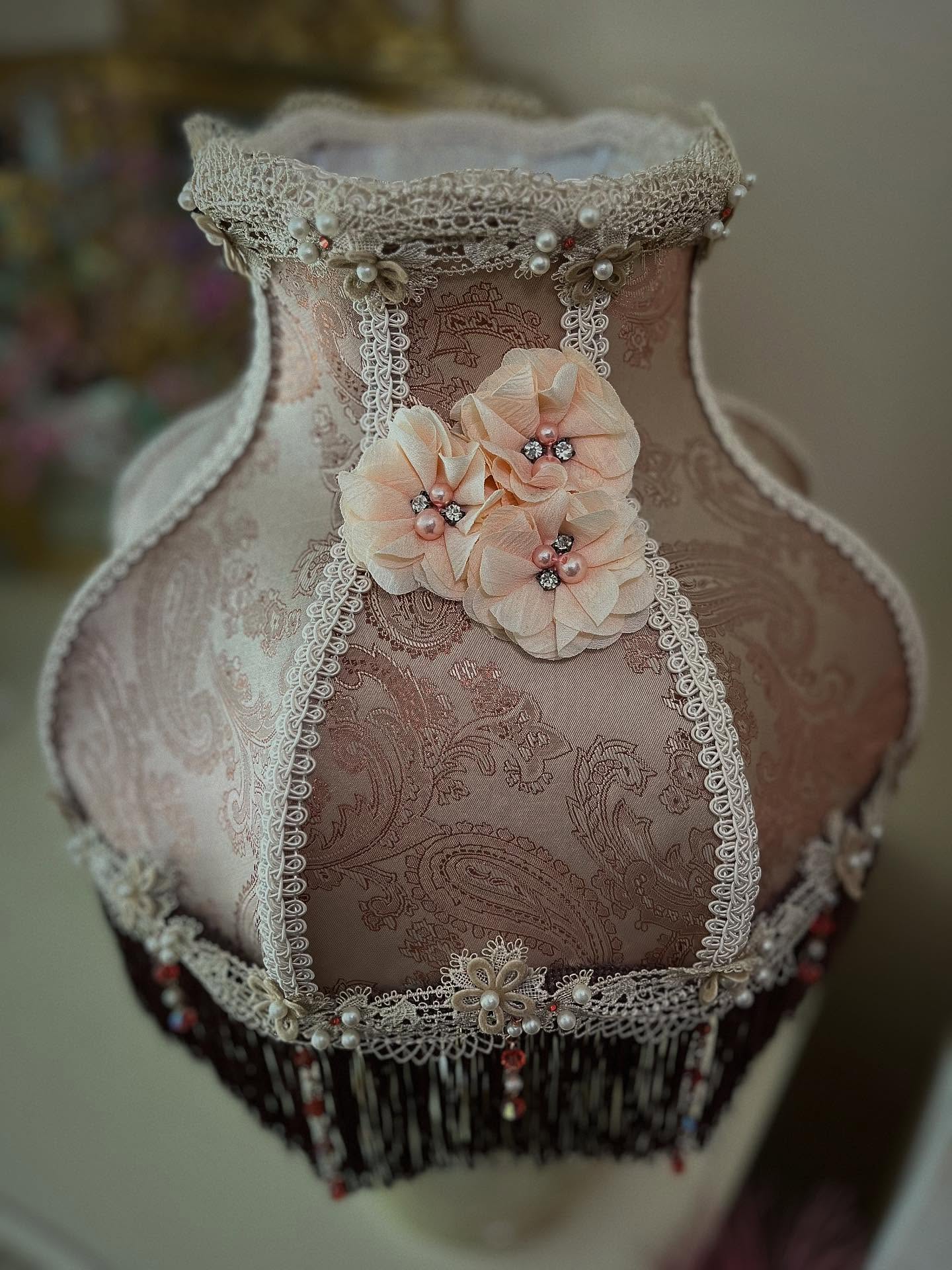 .
Name: Charlotte (Meaning - Free Man/Petite)
Colour: Cream/Peach/Brown/Paisley
Lamp Frame: Palace 12”
Lamp Style: Table Lamp
Category: Vintage Glamour
£318 - SOLD
Go to www.ritzyroguelampshades.co.uk