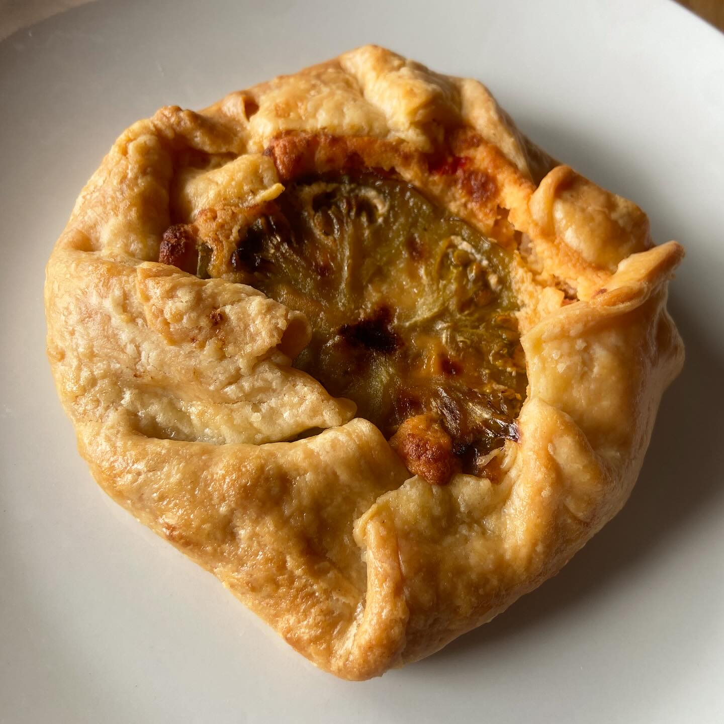 Green tomato, pimento cheese gallette made with an all-butter crust. Peak summer.