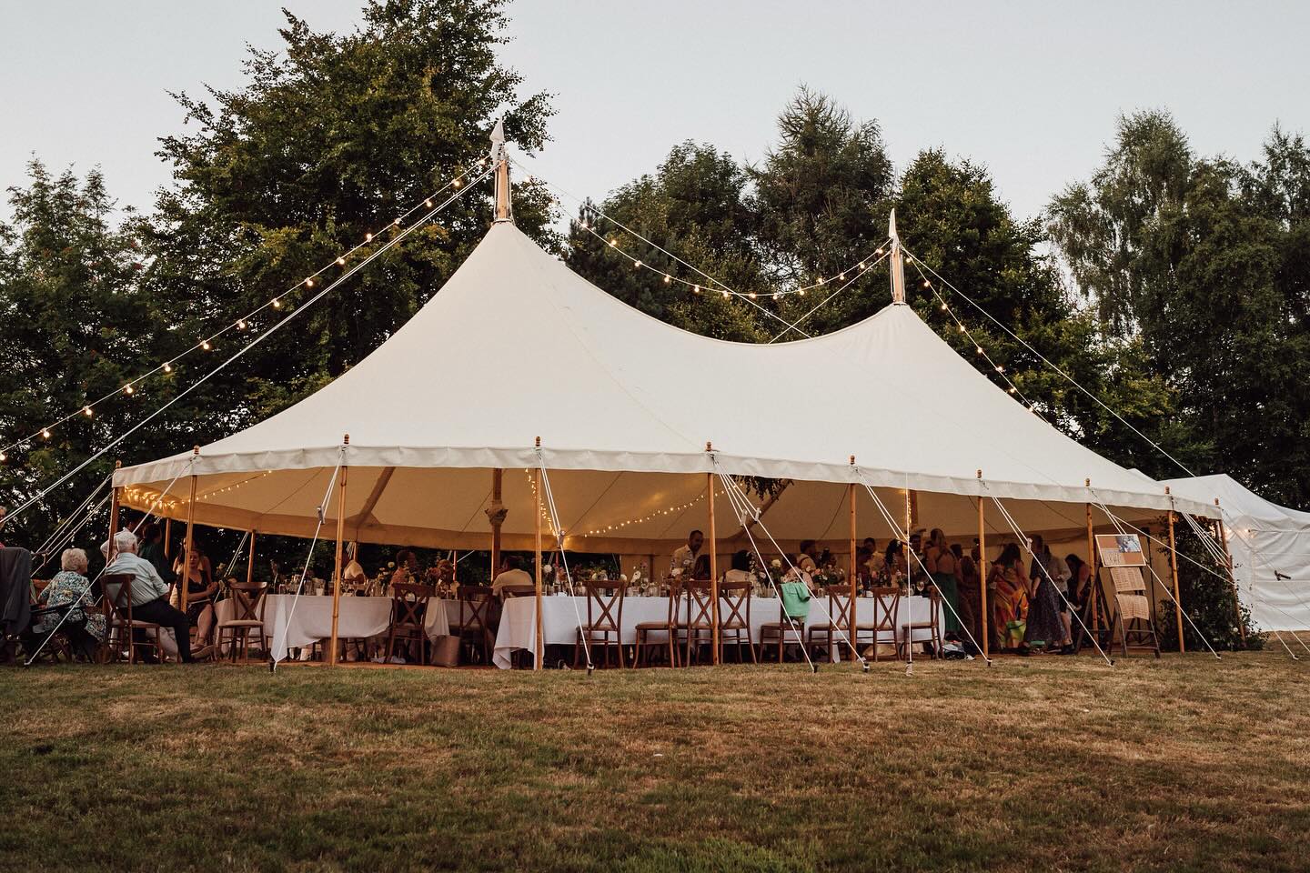 From the outside in, this is the very essence of a summer wedding!
Overflowing with vibrant blooms, floral bursts in every corner, and endless trestle tables stretching into the distance. With the marquee walls rolled up and the sunshine pouring in, it’s pure summer wedding magic.
Photographer - @bloomweddingsuk
Florist - @poppyscout_co
#greenfarmmarquees #itsawillsthing #summermarqueewedding
