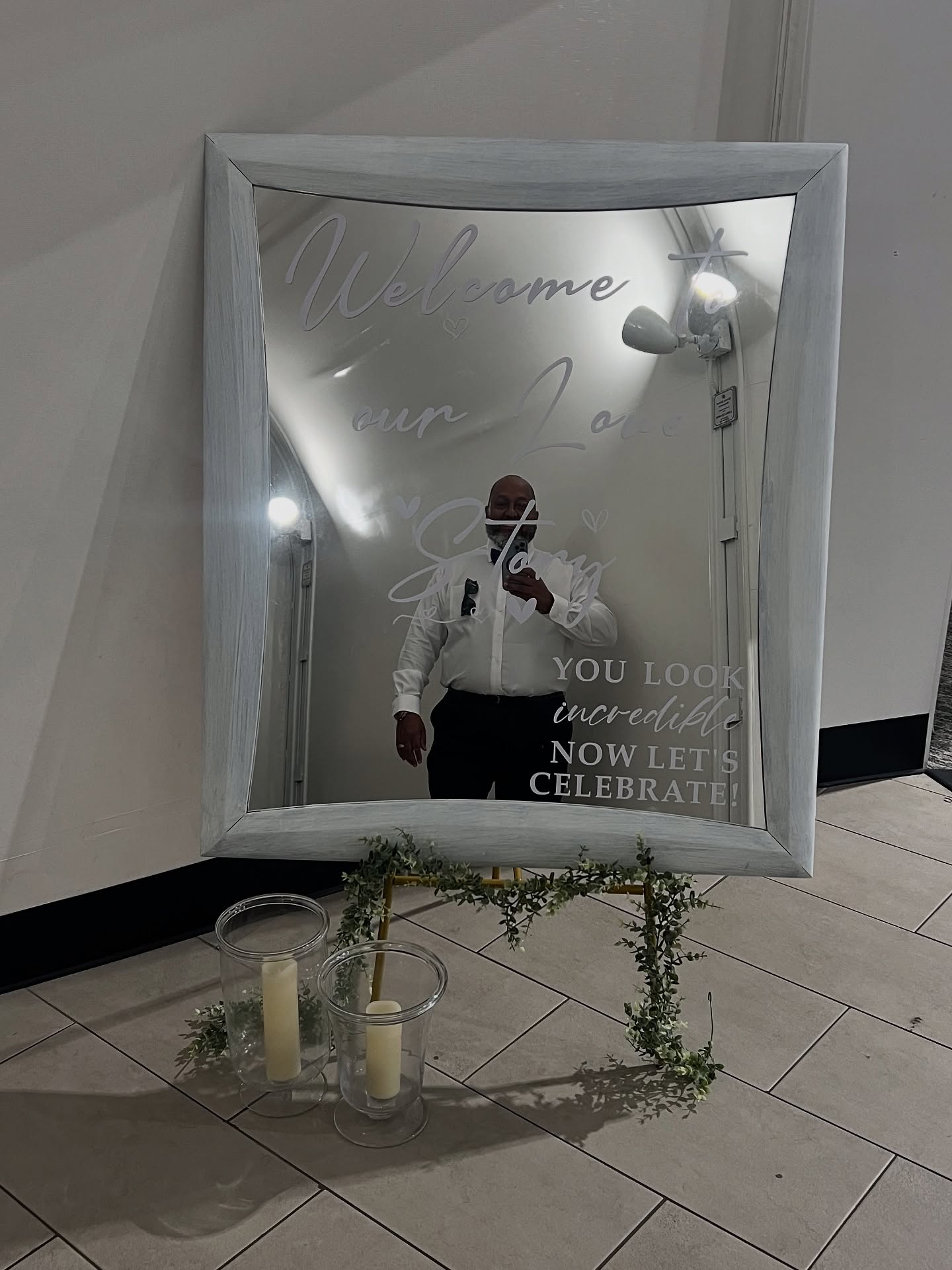 DYI mirror for a wedding.
I found a mirror at the local Goodwill for $10
Then I white washed it to give it a rustic look.
The decal writing on the mirror is from Amazon.
“Welcome to our love story, you look incredible now lets celebrate “
Place on an easel and decorate with flowers or candles