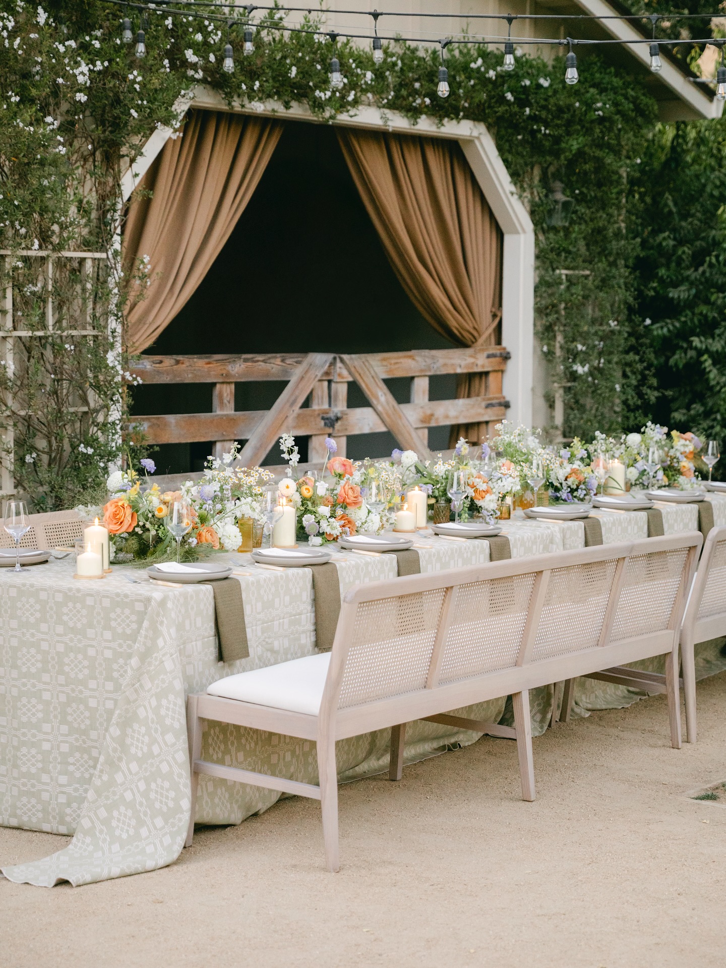 These benches became the heart of this Western-inspired rehearsal dinner at Holman Ranch, transforming the dining experience into something both intimate and unforgettable.
As we explored different layouts and seating options, nothing resonated quite like these benches. They brought a natural sense of warmth and ease, perfectly balanced by the thick woven textures that cascaded down the tablescape ~ creating a setting that felt personal, welcoming, and distinctly refined.
Planning & Design: @styledbylinds_
Photographer: @paulinaperrucciphoto
Florals: @fridayflowersevents
Venue: @holmanranch
Rentals: @hensleyeventresources
Linen: @bbjlatavola
Stationery: @beautifully_noted
#carmelvalleywedding #californiaweddingplanner #californiawedding #rehearsaldinner #carmelweddingplanner