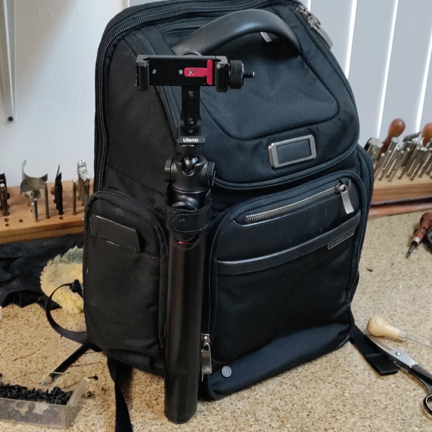 Guy brought in his back pack for a leather camera pole holder. Full grain black cowhide. #leatherrepair #leather #leathergoods
