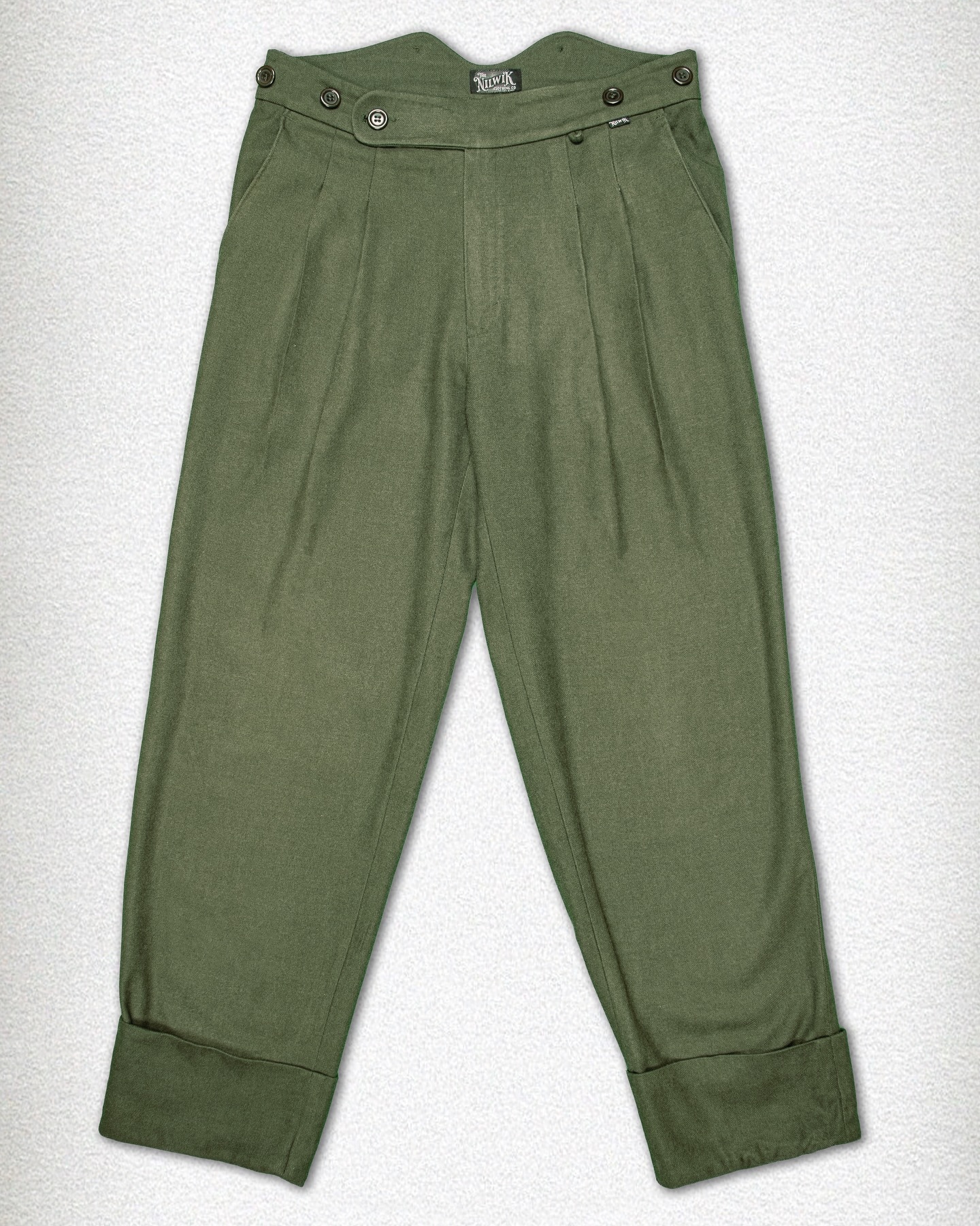 On high demand:
The Holback.
Loose Fit Trousers with Fishtail Waistband
The Holbeck pays homage to the craftsmanship of the early 20th century — think the 1920s, when style met substance. Cut from a rich wool blend, these trousers are designed with a loose fit: comfortable through the thigh with a straight, generous drape that reflects the tailoring of the era. The high fishtail waistband, complete with sturdy brace buttons, echoes a time when trousers were made to be worn with purpose — and suspenders.
The legs finish in a pronounced turn-up cuff, a practical detail of the past that today speaks to enduring style.
Available in three deep, character-rich tones:
Charcoal Grey – sharp, versatile, and understated
Coffee Brown – warm, refined, and full of depth
Forest Green – earthy, bold, and grounded in tradition
For those who understand that true style doesn’t rush.
#heritage #rugged #fishtaletrousers #trousers #vintagestyle #loosefit #workingclass #classic