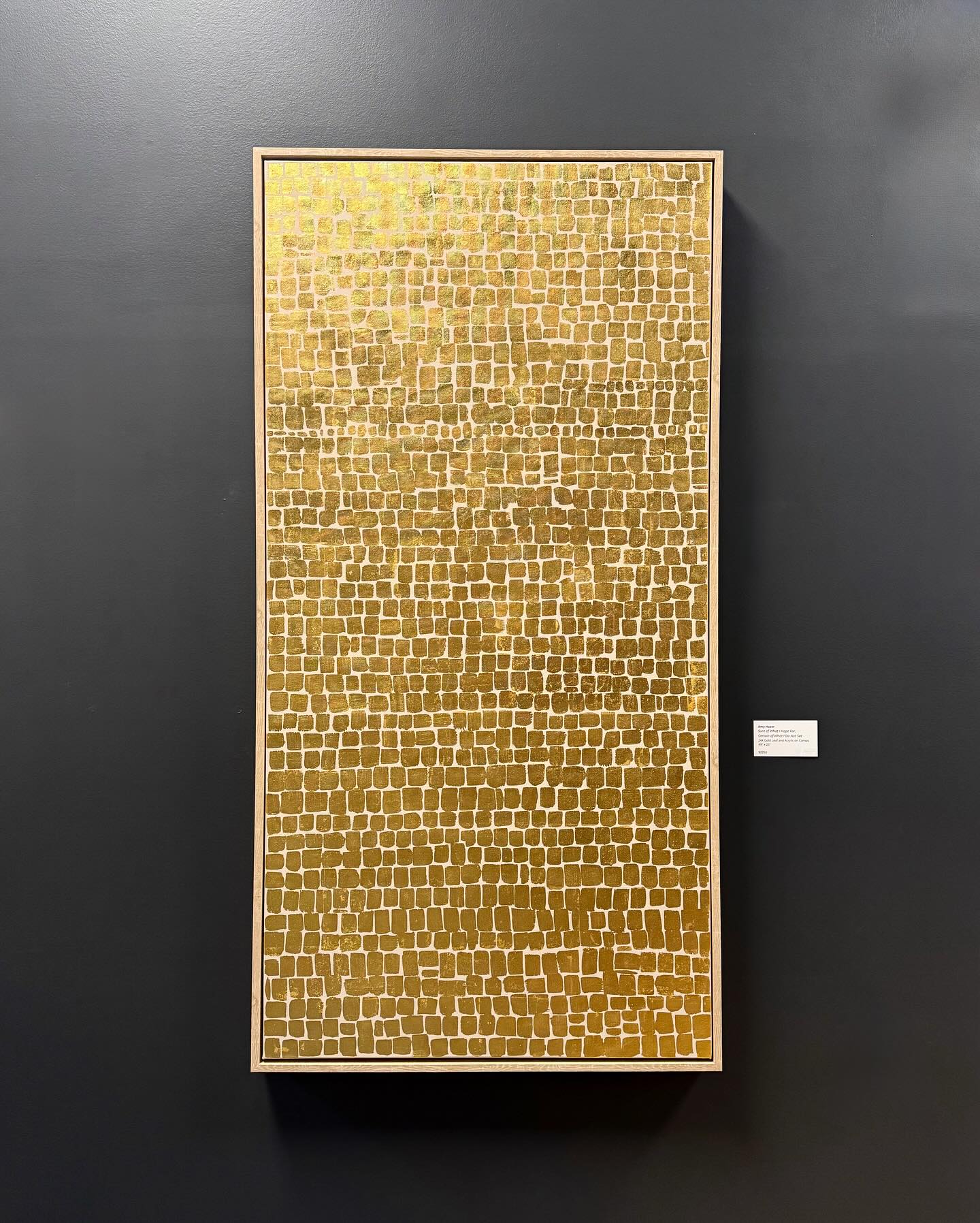 Because this piece is made with pure gold, it reflects differently depending on the environment it’s in. This is a direct nod to the idea that the way you glow or the light you reflect is appreciated differently in different spaces. The value of the material doesn’t change, but how much it glimmers and shines does depending on surroundings.
“Sure of What I Hope For, Certain of What I Do Not See” (49”x25”) Is available and on view at @somewhere.works. Contact @harvesterarts to inquire.