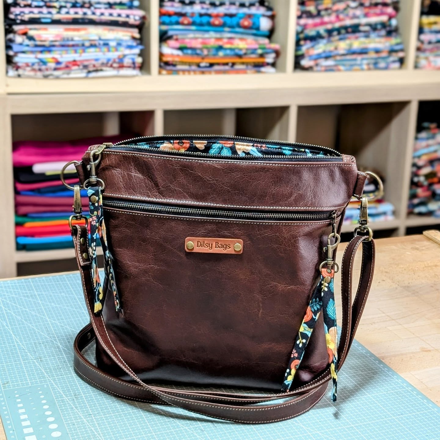 ✨ This isn’t just a bag — it’s a labour of love! Every piece of leather is hand-cut, every stitch carefully sewn, and every detail thoughtfully chosen to create something truly special. The floral accents bring a pop of colour, while the rich leather only gets better with time.
When you carry this bag, you’re carrying a story — one of patience, creativity, and care. 🌿
📍 Handmade with love, just for you.
#HandmadeBag #LeatherBag #CrossbodyBag #ArtisanMade #HandcraftedWithLove #SlowFashion #EverydayBag #BohoStyle #DitsyBags #MadeWithHeart #BagLove #LeatherCraft