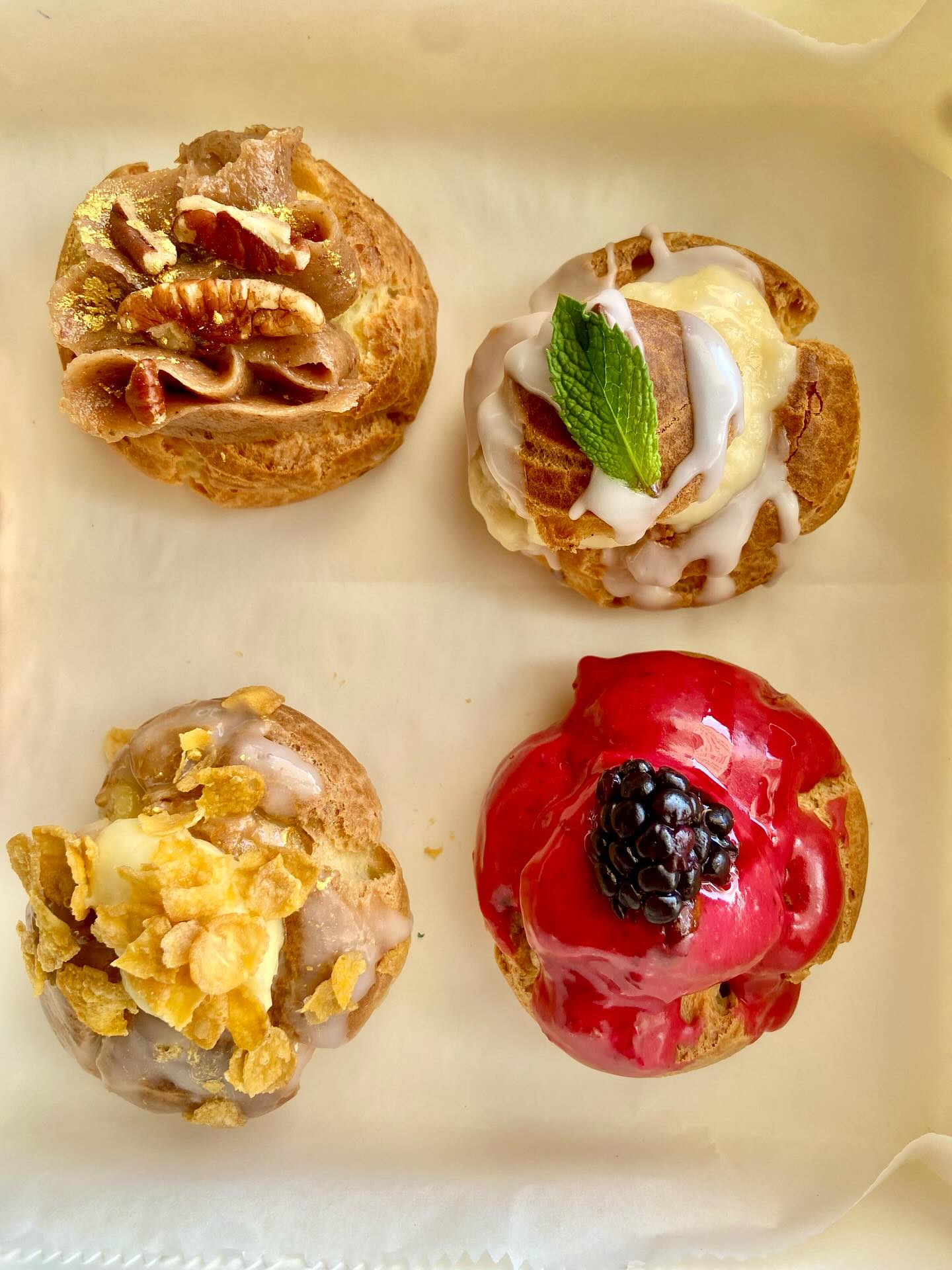 This week’s pastry box was probably one of my absolute favs! Cream puffs & eclairs. All southern flavors. Saucy. Yummy.