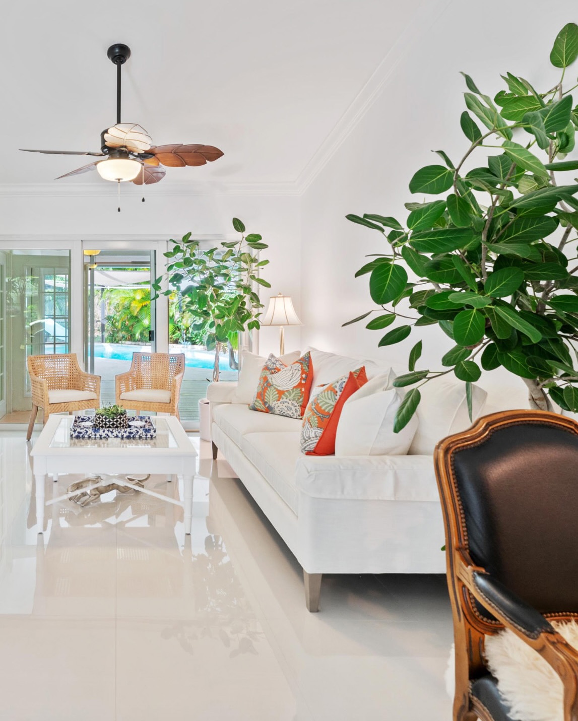 Breezy, bright, and inviting 🌿✨ This PGA National living room was staged to highlight its natural light and airy flow. Crisp white walls and glossy floors create a fresh canvas, while vibrant greenery and tropical-inspired pillows add warmth and personality. The white piano brings an elegant touch, balanced by woven textures and organic accents that connect the space to the lush outdoor pool view. Perfect for showcasing Florida living at its finest—relaxed, refined, and ready for entertaining. 🏡☀️
#HomeStaging #InteriorDesign #BrightLivingRoom #FloridaHomes #TropicalDesign #StagedToSell #InteriorStyling #PalmBeachLiving #CoastalInspired #ModernElegance
#homestaging works #pganational #pganational #palmbeachdesign #palmbeachstyle #palmbeachgardens