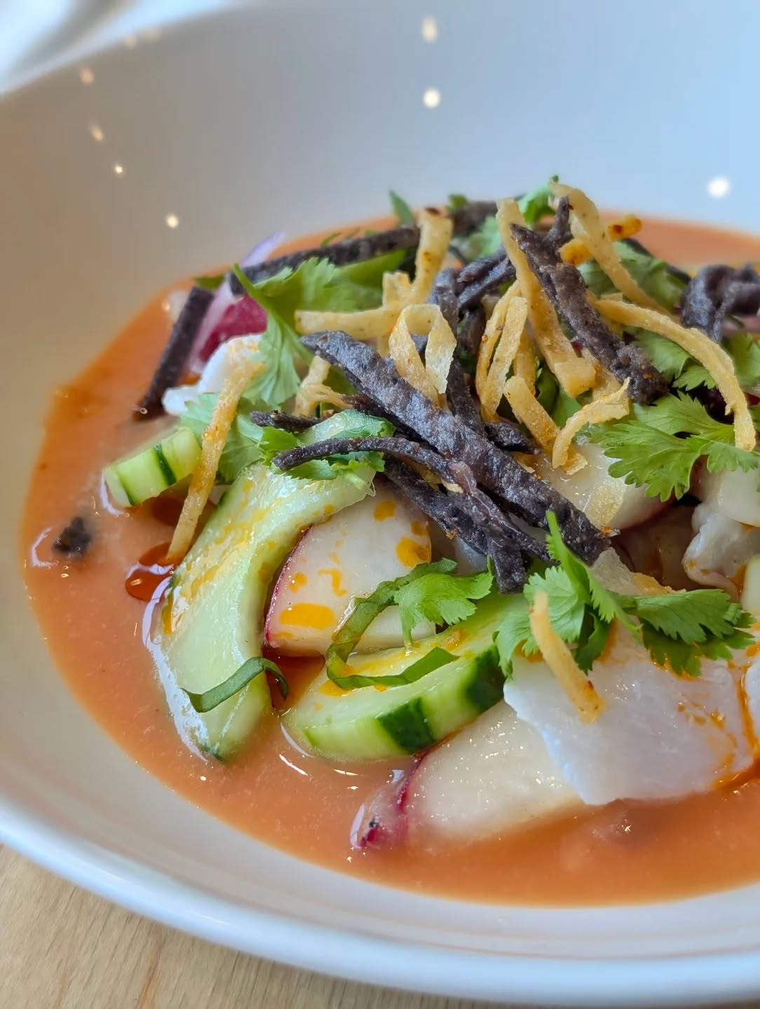 Wild Seabass, Aji Limo & Grilled Peach Aguachile
Probably one of the most refreshing dishes we've had on the menu this summer. Probably a few days left of it before peaches disappear for the season. We make the aguachile using peaches, marketmore & passandra cucumbers @shrub.london. We grill peaches, thinly slice wild seabass @brightonfishsales and add some coriander @pitfield.veg. We finish it with some fried tortillas
#latinfood #localfood #summer #wildfood #localrestaurant #brightonfood #brightoneats #bibgourmand