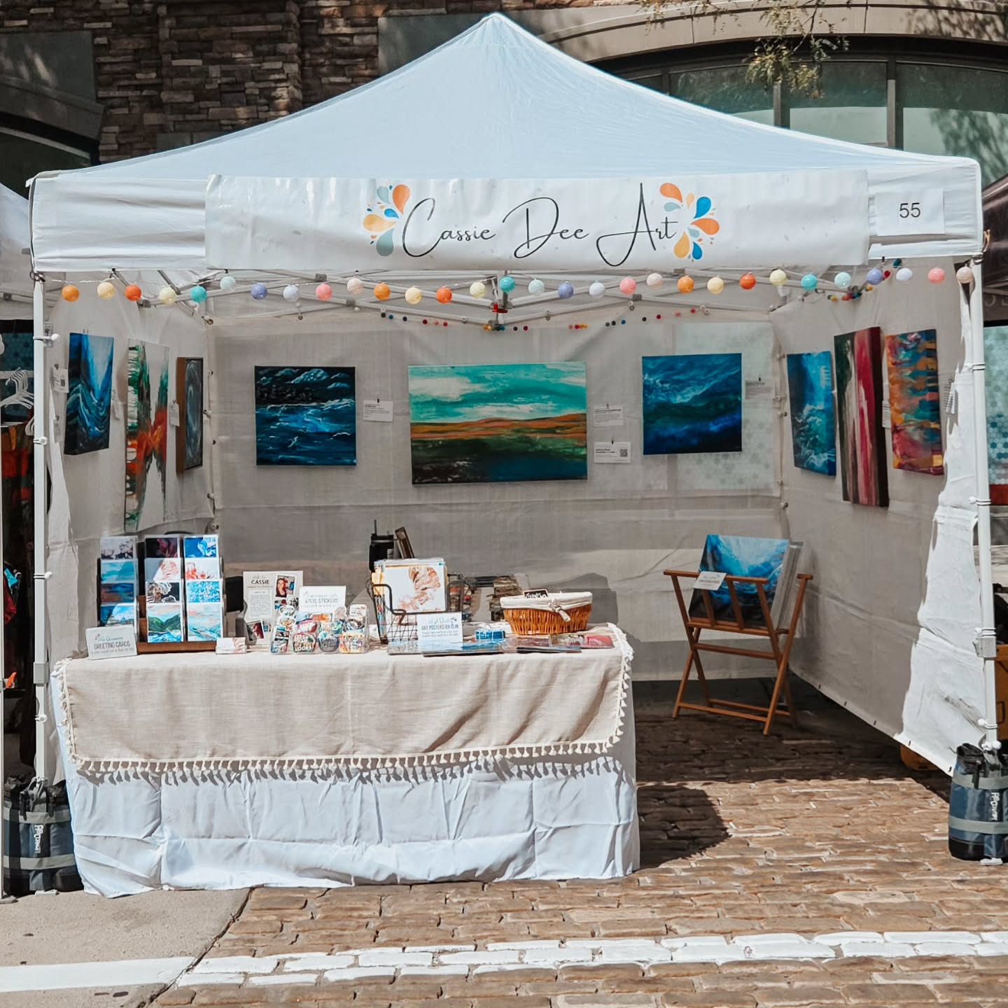 We’re all set up at Urban Arts Festival at the Gateway!
I’ll be here today until 10pm with my paintings, coasters, prints, and greeting cards. 💌
There’s so much to see and do! Come browse the art, catch live music, grab some amazing food, and don’t miss the lowrider cars. 🚗
If you’re out and about, come say hi 👋
I am right across from the doors to the North Parking garage. I’d love to see you!
#UrbanArtsFestival #GatewaySLC #SupportLocalArtists