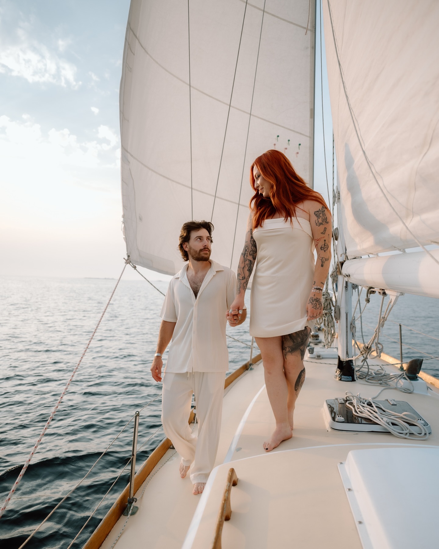 PICTURE THIS: You want your wedding day to feel intimate, adventurous, and you want to be surrounded by nature and have a casual day with your partner. If this sounds like you, you might want to elope on a sailboat in Door County!
Your elopement day could begin in the peaceful harbor of Sister Bay, where the calm waters reflect the late afternoon light. With just your officiant, photographer, and captain aboard, you set sail into Green Bay, leaving the shore and the rest of the world behind. Beneath crisp white sails and an endless blue and pink sky, your ceremony could be nothing short of magical by exchanging heartfelt vows. The blue water sparkles around you, and the rugged shoreline of the Door County peninsula stands as a quiet witness to your promises.
Vendors:
Photographer: @briannakraftphotography
Host: @emilystonelakephotography
Models: Jessie + John
Sailboat Charter: @saildoorcounty
Location: Sister Bay, Wisconsin
Keywords:
Door County Elopement | Door County Elopement Photographer | Door County Wedding | How to get married in Door County | Sailboat elopement Door County | Private sailboat cruise | Midwest Elopement Photographer | Wisconsin Elopement Photographer | Where to elope in Wisconsin | Adventure Elopement | Wisconsin Adventure Elopement | Wisconsin Wedding Photographer | Wisconsin Engagement Photos | Sailboat Engagement Photos | Outdoor wedding | Elopement 2026 | Adventure Wedding | Wisconsin Elopement Ideas | Wisconsin Elopement Inspiration