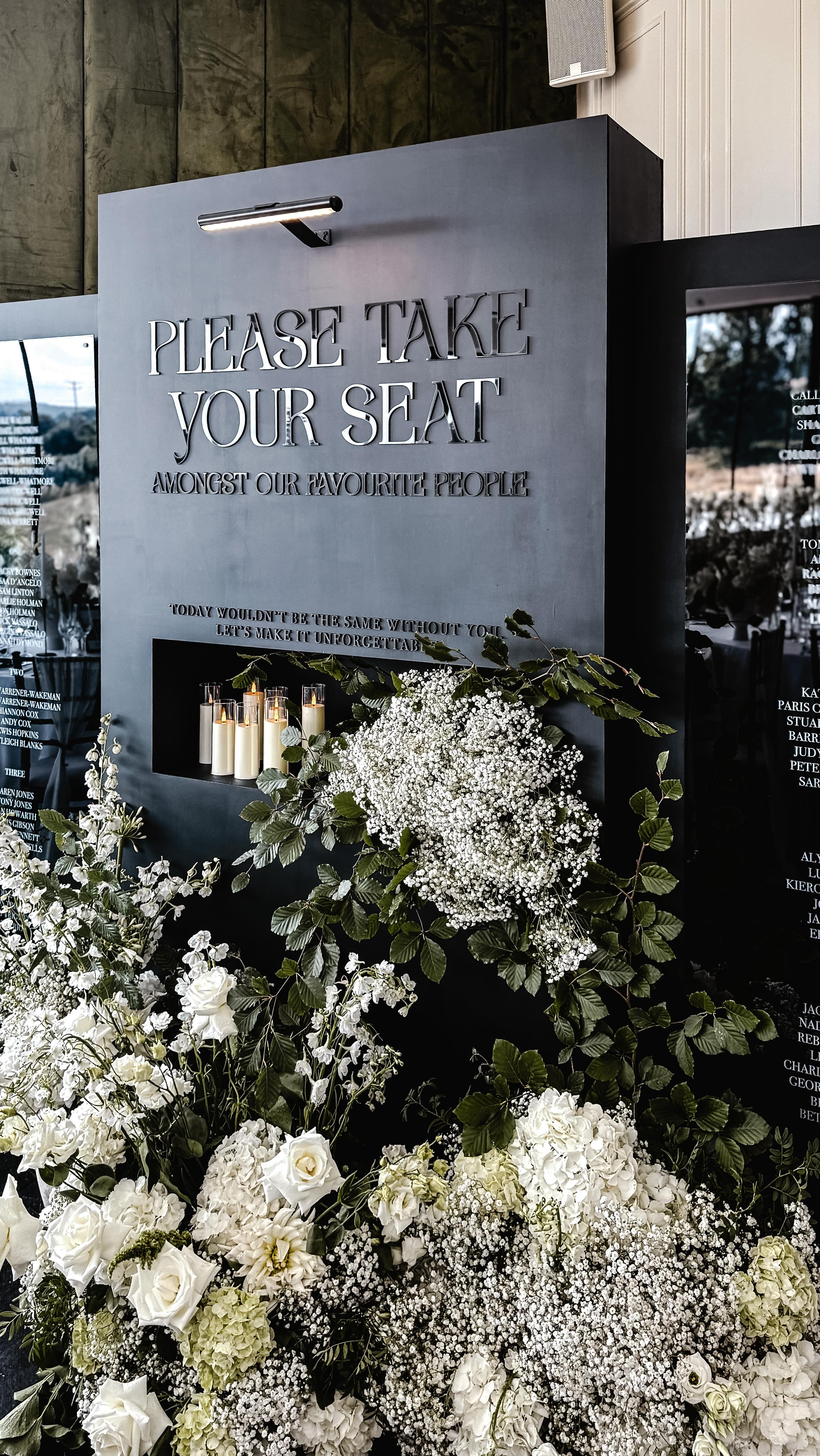 What wedding reception dreams are made of ~
Zoe and Gareth got married on Tuesday at the stunning Sant Ffraed House amongst their favourite people, surrounded by nothing but beauty.
They were welcomed into their wedding breakfast by their unreal wedding planner Sarah, The Function Band, an abundance of breathtaking florals and our bespoke made Table Plan signage.
Their reaction was something that every wedding industry professional dreams of and more.
An unreal team of suppliers worked seamlessly together to bring Zoe and Gareths dream day to life and it was an honour to be apart of.
The team:
Wedding Planner:@sarahlouiseweddingplanner
Venue: @santffraedhouse
Videographer: @steveratcliffefilms
Photographer: @staceyclarkephotoweddings
Content creator: @betweentheshots.content
Florist: @evefranscescadesign
Dress: @allabouteve
2nd dress: @evaashley
Robe: @evaashley
Suit: @dyfedmenswear
Makeup bridesmaids: @nicolamua
Makeup bride: @zoetrigwell
Hair: @n20hla
Ceremony singer: @ryandaviesmusic @satoriweddings
Drinks reception sax: @satoriweddings
Wedding breakfast and evening entertainment:@thefunctionband
Stationery & Signage: @km_stationeryanddesign
Table scape decor:@simplybowsandchaircoverwales
Disco balls: @ohsocurious
Tattoo:@finelineboy
#weddingreception #weddingbreakfast #weddingreveal #weddingsignage #weddingsign #weddingtableplan #weddingseatingchart #weddingseatingplan