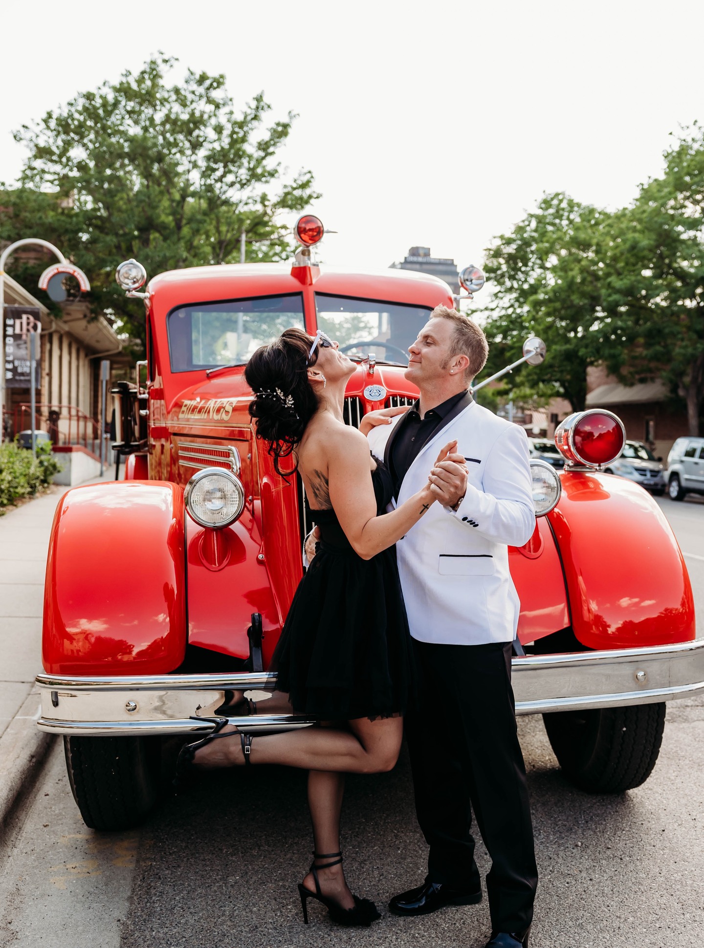 From Classic to 🔥🔥🔥
Just when we thought this couple couldn’t get any more iconic… they changed outfits and gave us timeless to totally turned up in one perfect wedding day.
✨She slipped into a short, flirty reception dress.
🔥He traded his suit jacket for cool confidence.
🚒And together? They posed in front of Billings’ first historic fire engine—again—but this time, with all the fun.
Because your wedding day can be elegant and playful. Romantic and bold. Black tie at the ceremony, party-ready by sunset.
At Katie Taylor Events, we’re here for both versions of you—and every stylish moment in between. 🥰
Wedding Planner: @katietaylorevents21
Photography: @amberreneephotographer
Venue: @historicbillingsdepot
Catering: @abbyscateringcompany
Bar: @rainbowbarbillings
DJ: princepartyproductions.com
Hair: @barr.beauty.hair
Cake/Sweets/Dessert: Dancing Oven Bakery | Billings
Ceremony Backdrop & Reception Bistro Lights/Draping: @better2gather
Personal Florals: @solawoodflowers
Signage and Invitation Suite: @zazzle
Bride’s Dresses: @stepnoutbridal
Seamstress: @jennas.bridal.alterations | @stepnoutbridal
Bride’s Accessories: @bellabelleshoes
Bridesmaid Dresses: @jjshouseofficial
Groom’s Tuxedo & Suit: @stepnoutbridal
Groom’s Watch: @rolex
Groomsmen Suits: @stepnoutbridal
Rings: @riddlesjewelry
#katietaylorevents #weddingplanner #weddingplanning #wedding #weddinginspiration #weddingdress #groomsuit #stressfree #luxuryweddings #billings #montana #montanawedding #fireengine #firefighter