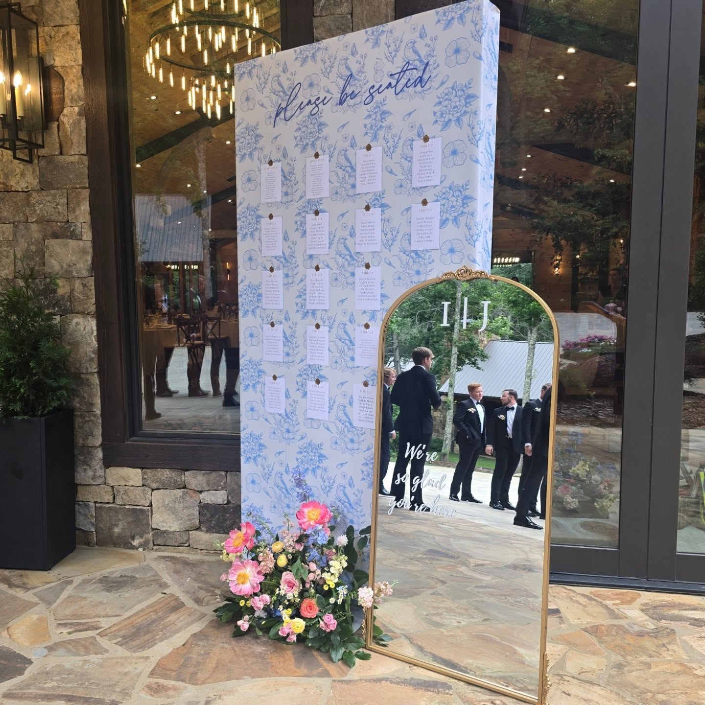 Not just a seating chart, but a statement piece! Custom elements like this installation don’t just guide guests to their seats, they set the tone, elevate the experience, and capture unforgettable reflections... like the groomsmen waiting to walk down the aisle.
#custommirror #customseatingchart #weddingdetails #eventsignage #photoopp #weddingdecor #seatingchartideas #EventDetailsMatter