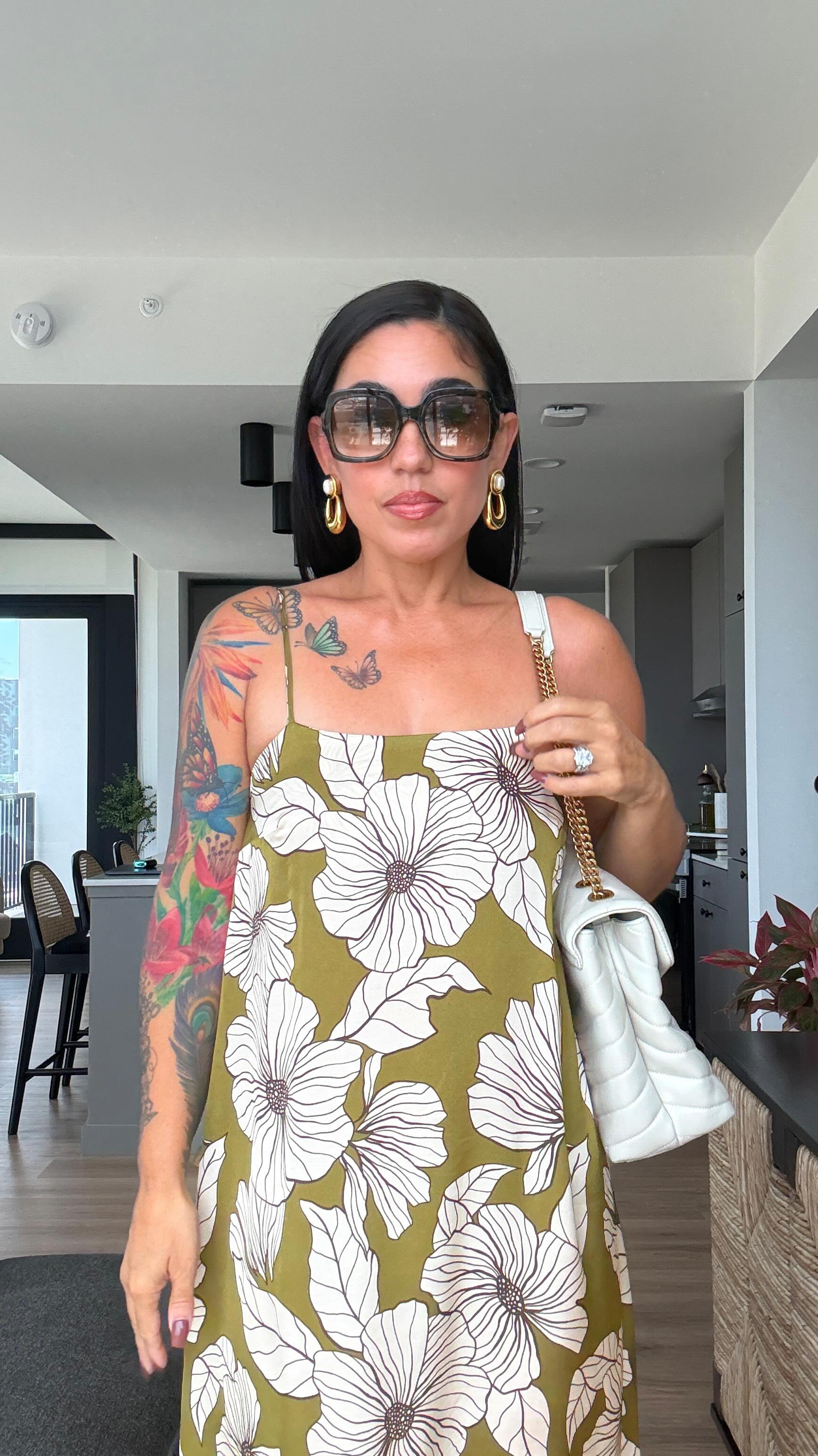 I’m obsessed with this #soligdress by @paradisepatterns it’s so comfortable to wear. I decided to use a satin print for this dress and it’s just lovely. I also love the French seams and built in shelf bra. The fabric is from @corefabrics