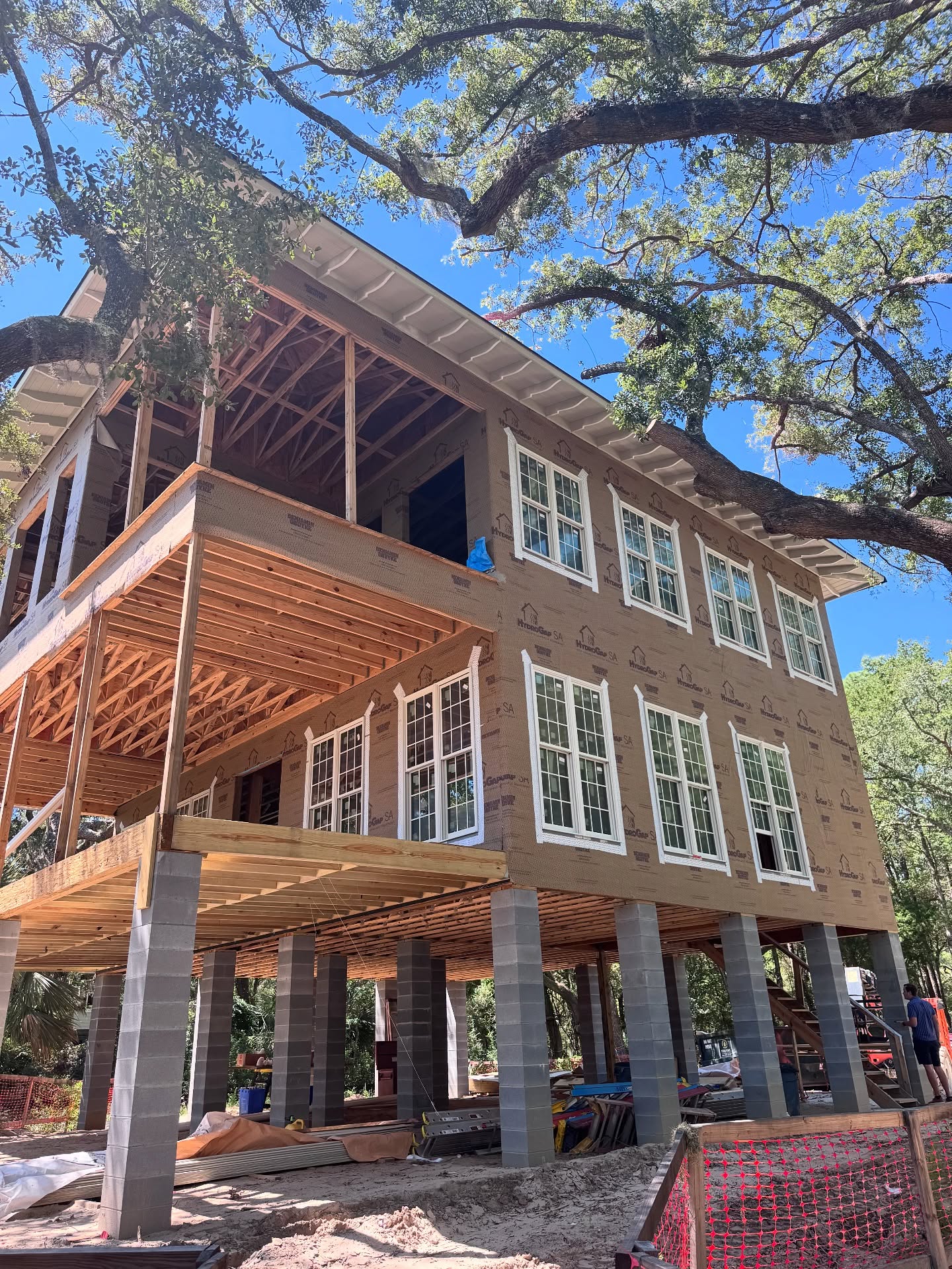 Days like this remind us why we love building near the water. Sunshine, breeze, and the rhythm of progress. This house is rising strong on the Intracoastal. #PerchedArchitecture #lowcountryliving #homedesign