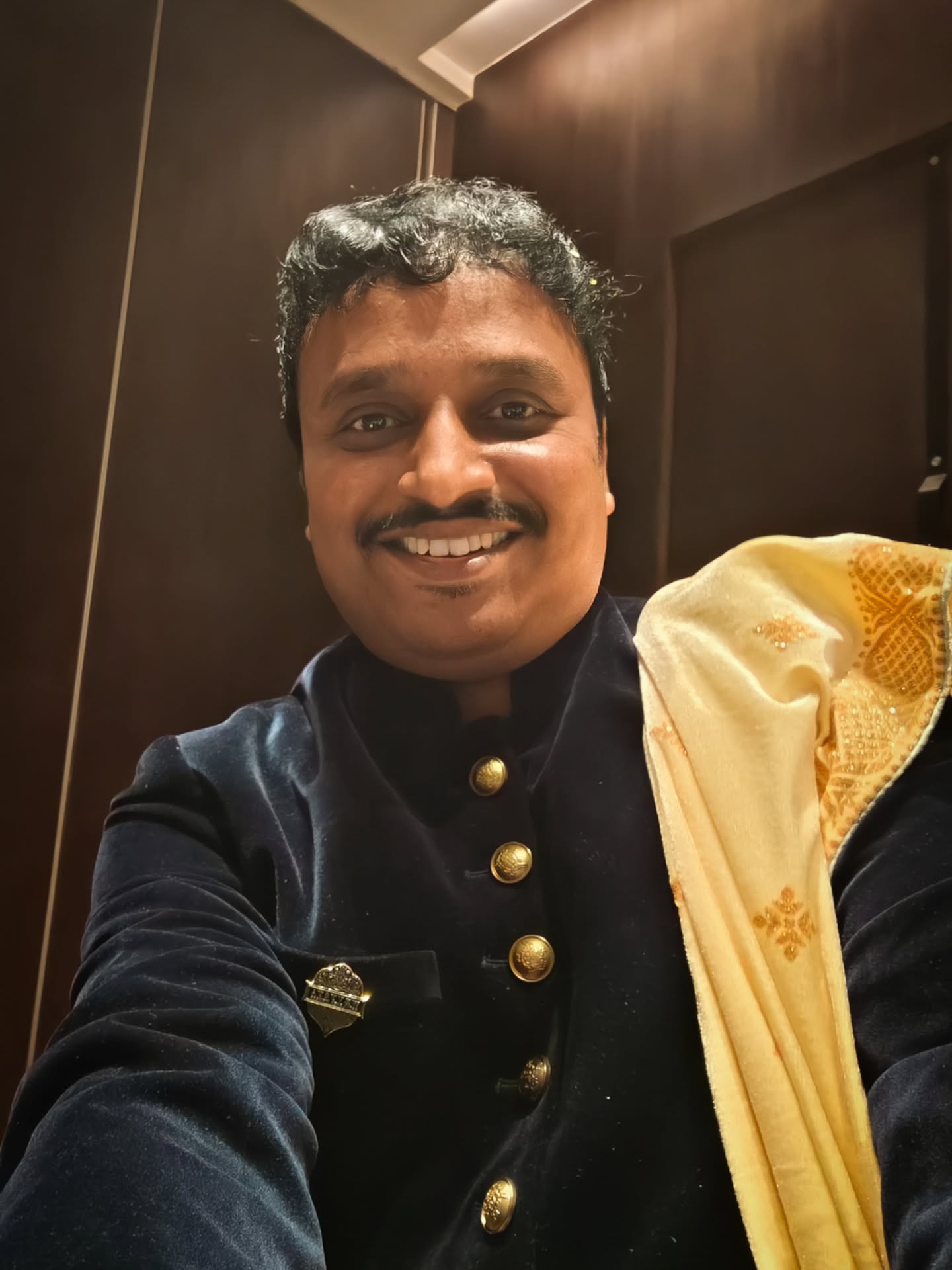 Dressed in tradition, wrapped in gratitude, and smiling with confidence.