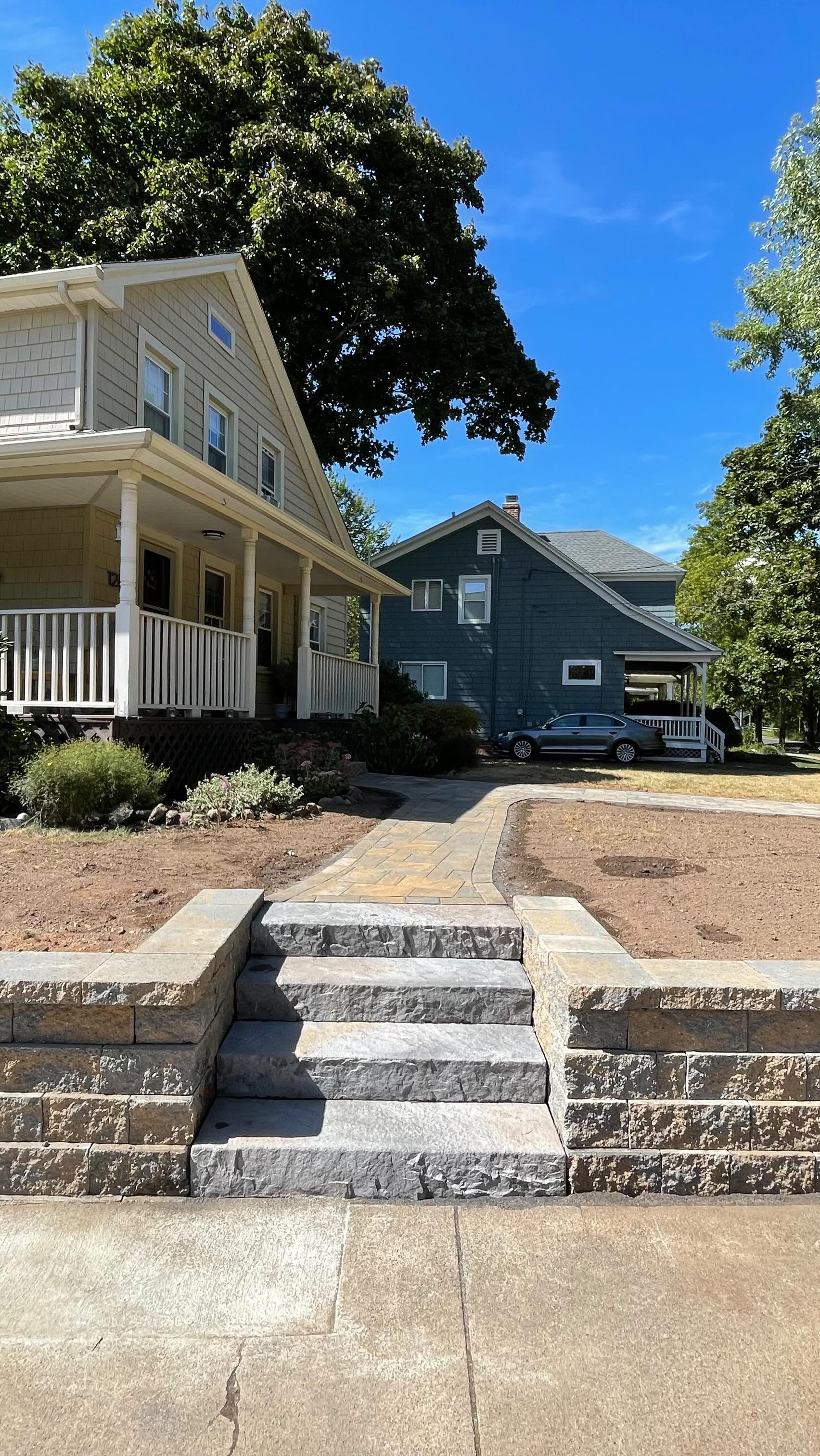 Transformation Complete!
This project features a custom retaining wall, elegant steps, and a beautifully laid paver walkway. @brian.stiltner @affordableequipmentrentalct @nicolockpaving
#RetainingWall #PaverWalkway #StoneSteps #HardscapeDesign #OutdoorLiving #LandscapingProject #BeforeAndAfter #HardscapeContractor #CurbAppeal