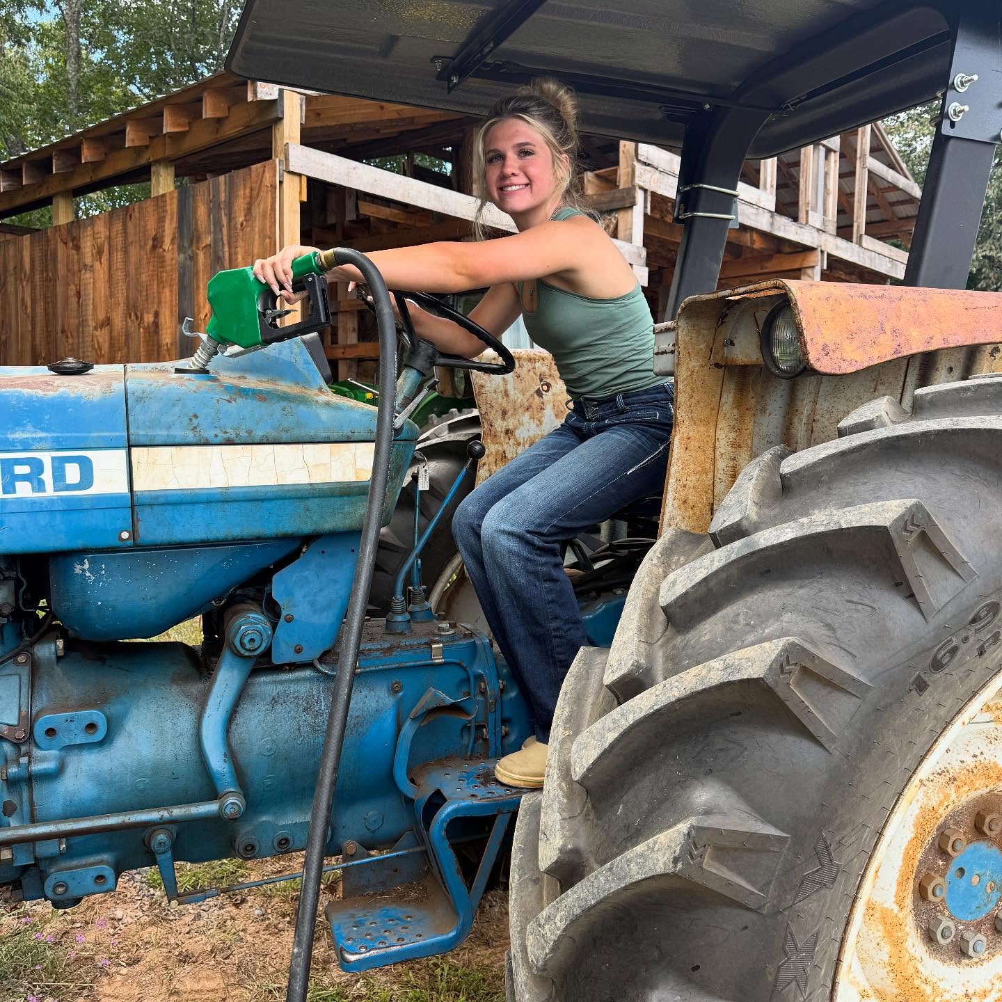 Brie helping get Big Blue ready for some haying.
#haying #tractor #daughter #beauty