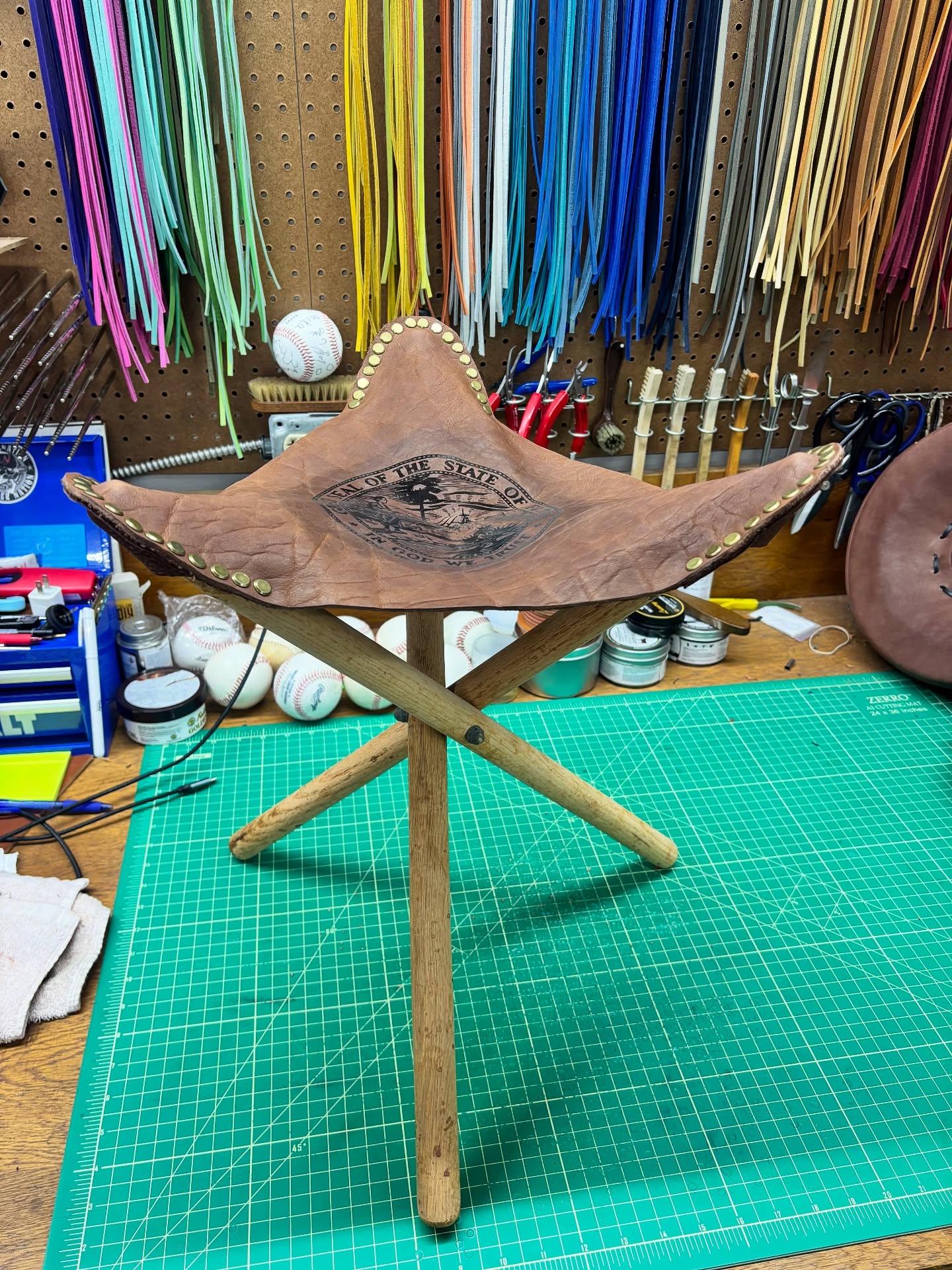 Found an old leather stool in pops attic. The leather was so old it tore like cardboard and came with leather lace for putting it all together. I had some bison leather I picked up from @calaveratool remnant sale and some Chicago screws. Laser engraved the Florida State Seal and it turned out pretty good. Kept a pattern so maybe one day I’ll make some more. Kind of a fun project all in all.