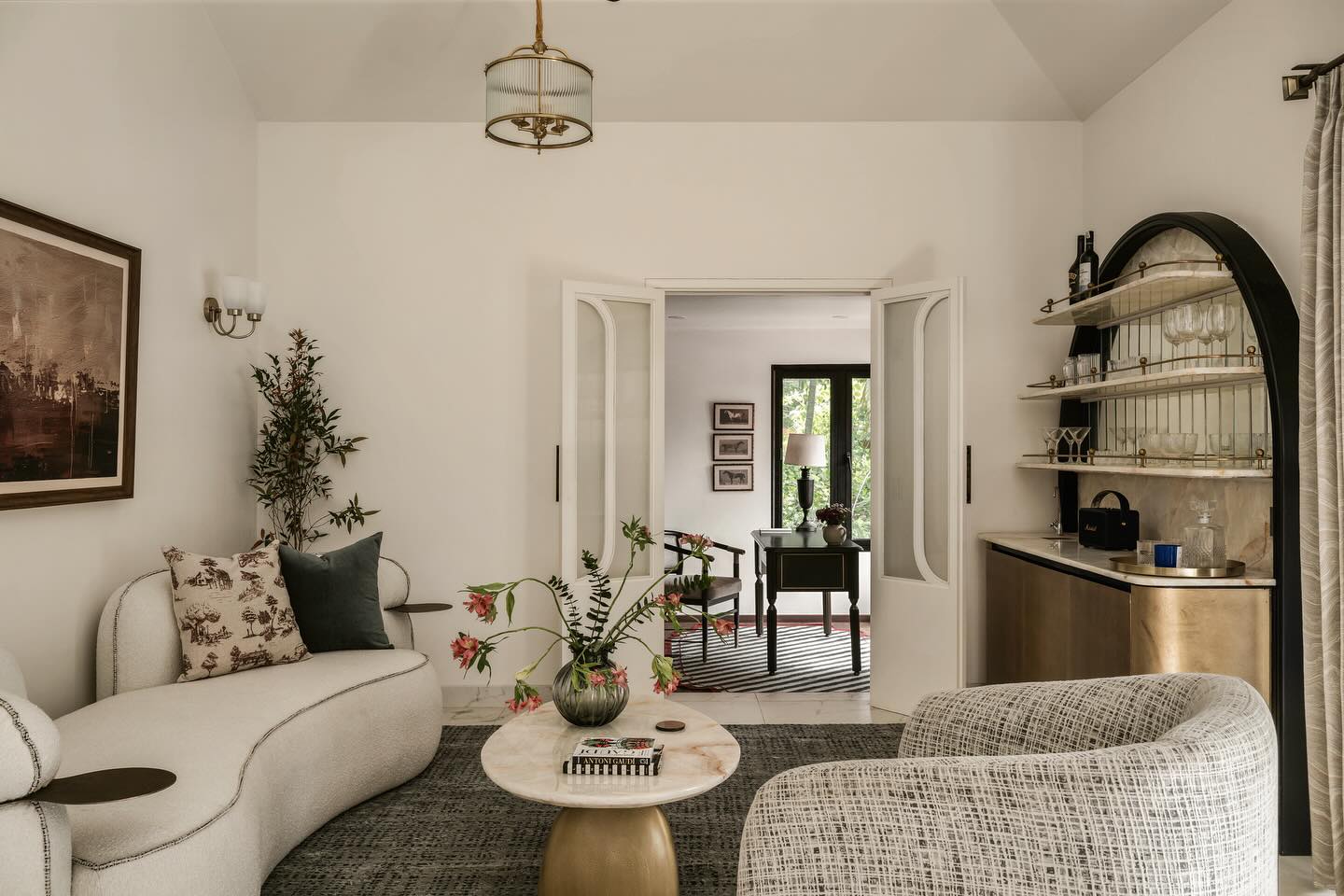 Villa Amara — Where Indian Soul Meets Colonial Grace
Amara, meaning eternal, is the perfect name for this home — a sanctuary where heritage and modernity flow seamlessly together. Designed and executed by Furbishy as a full-scale project from civil works to interiors and styling, Villa Amara embodies timeless elegance with a distinct cultural heartbeat.
Every arch, verandah, and colonnade nods to colonial grandeur, while intricate details, textures, and materials celebrate the richness of Indian design. From structural reimagining to the final curation of art and objects, the home was conceived as a complete transformation — not just built, but sculpted into being.
.
.
Photography : @nayansoni21
Shoot styling : @theshalomhome
Rugs - @jaipurrugs
Furniture Custom Design : @struo_living
.
.
.
.
#furbishyhomes #bespokeinteriors #luxuryinteriors #bangaloreinteriors #villainterior #luxuryapartments #renovation #homerenovation #homestyling #bespokeinteriordesign #hyderabadinteriors #indiamodern #colonialhomes #furbishyinteriors #ModernIndianInteriors #ModernIndianHomes #LuxuryMinimalInteriors #SouthIndiaInteriors #IndianMinimalism #LuxuryInteriorsIndia #ContemporaryIndianDesign #MinimalistIndianHome #BangaloreHomes #HyderabadHomes #InteriorDesignBangalore #InteriorDesignHyderabad #BangaloreLuxuryHomes #HyderabadLuxuryHomes #LuxuryHomeInteriors #luxuryresidentialinteriors