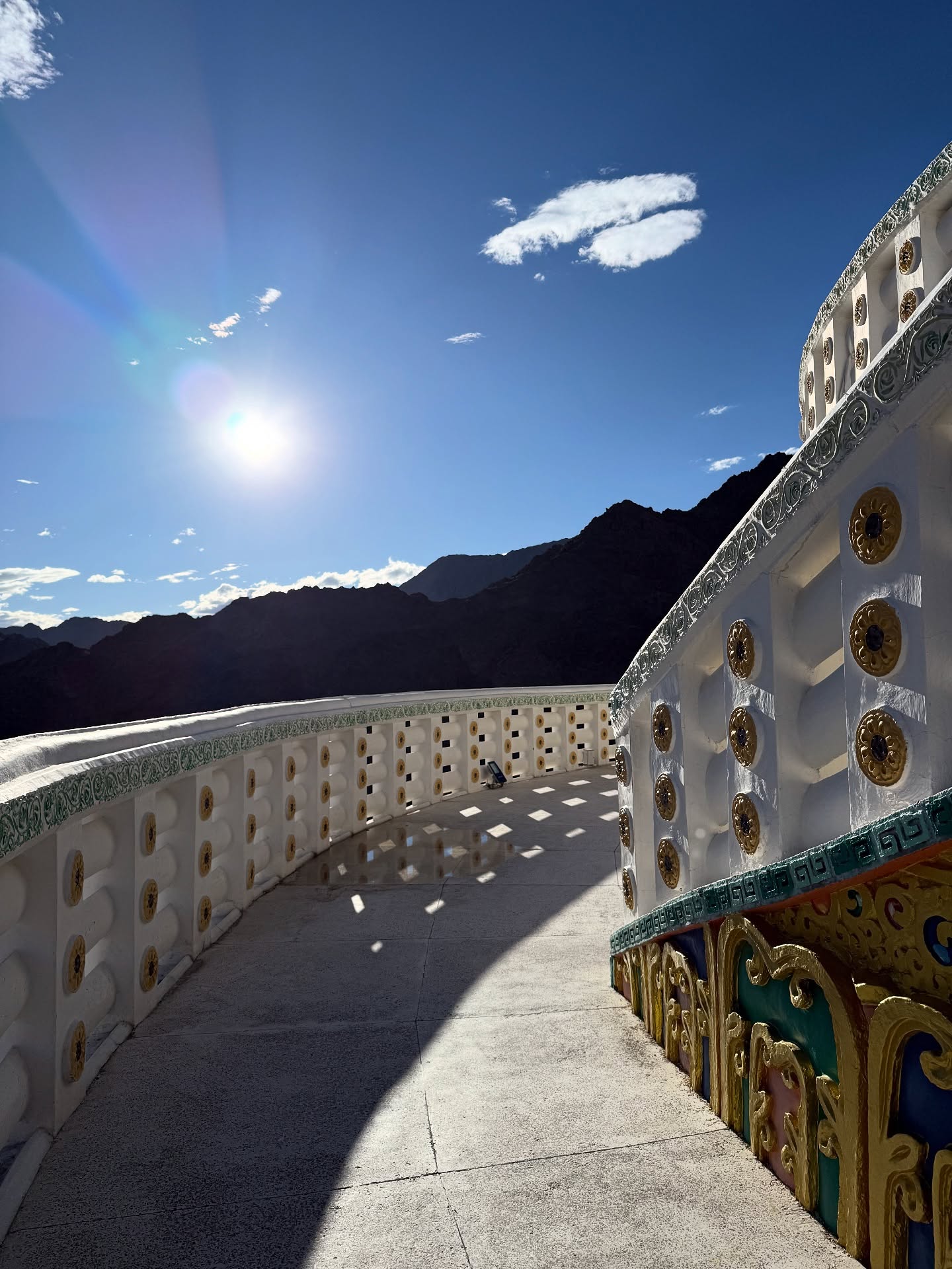 The Shanti Stupa, situated over 3600 meters above sea level in Chanspa, Leh, is a revered Buddhist site. Built by Japanese Bhikshu Gyomyo Nakamura in 1991, the stupa’s white dome dominates the landscape. With the 14th Dalai Lama having enshrined Buddha’s relics at its base, Shanti Stupa attracts tourists and devotees alike, drawn by its panoramic views and profound spiritual significance.
#leh #ledakh #himalayas #buddism #india