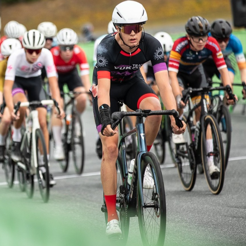 What a journey it’s been this year witnessing Heron pursue his dream of becoming a competitive cyclist. He hustled all winter to cover all of his own equipment and travel costs (no small feat!), all the while training and studying the sport in detail. He had a remarkable breakout early season at both gravel and road nationals, and was selected to race in Belgium and the Canada Summer Games in both road and mountain biking, only to have to let that all go after breaking his arm in July at mountain bike nationals. To go from such a big high to such a big low was heartbreaking, but he continued to train indoors on the Zwift and tried to look forward to next season instead.
This week he was given a last-minute opportunity to race in Vermont at the biggest Junior stage race in North America (Green Mountain Stage Race), and he jumped on it despite being just 6 weeks post-fracture. He needed a chauffeur on race days so Jocelyn got to go too, and it was incredible to watch him in action, navigating the joys and challenges of racing daily, and showing that he can compete with the big teams and big names of North America. We are so incredibly proud of him, and so grateful to all of those who have supported him this year in the Yukon and beyond. Can’t wait to see where this dream leads him next.