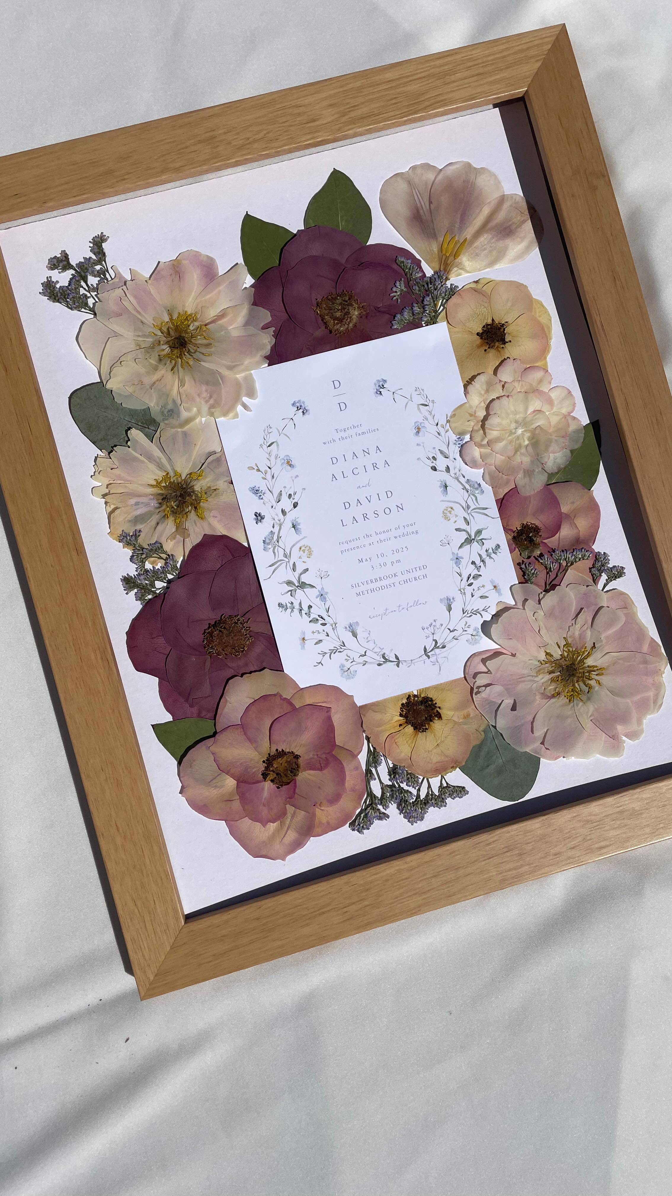 Gotta show some love for Diana’s 11”x14” invitation frame. Our most popular look for pressed frames is a “floating style” which is when the flowers are held between two pieces of glass, which is always beautiful, but I LOVE when I get to design on a white mat. It always looks so fresh, clean and really makes flowers pop!
.
.
Featured is our 11”x14” frame in natural wood
.
.
.
Interested in preserving flowers? Visit us at Heirbloomcreative.com to learn more about our offerings and the process.
#floralpreservation #floralpreservationart #floralart #pressedflowers #pressedflowersartist #saveyourbouquet #rvaengaged #rvasmallbusiness #rvaartist #richmond #virginia #heirbloom #creative