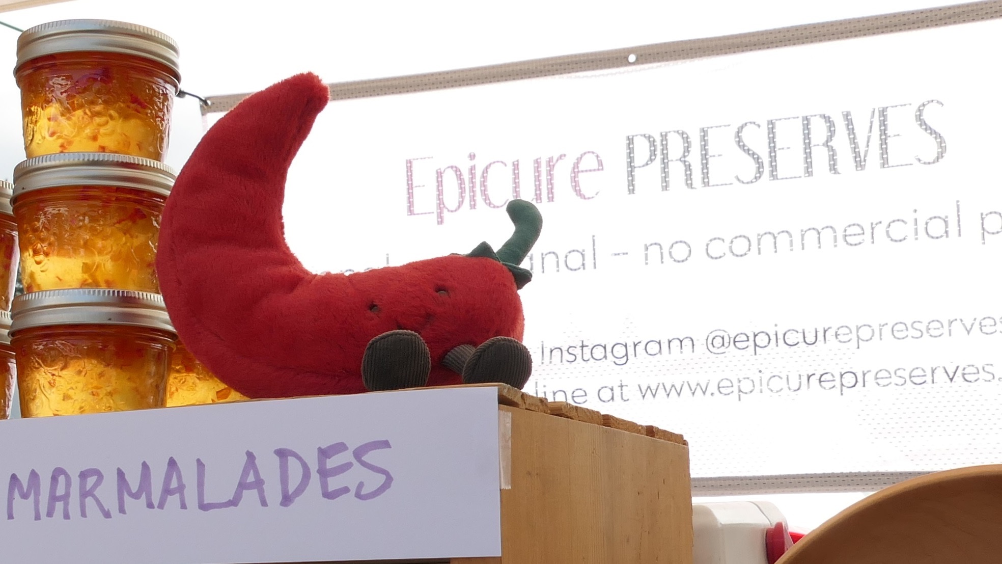 Wow, I can’t believe it’s September… where did the summer go?!
But the sun keeps shining and many thanks to Vancouver photographer Max Hesse, who captured this lovely shot of our best seller – apricot habanero jelly – perching in the sunshine at the last @ubcfarm Farmers Market. Note that marmalade season is around the corner in late October, but right now it’s peak season for BC Lower Mainland produce.
The cucumbers have hit their delicious nutritious peak, and the dill weed is still happily flowering @forstbauerfarm, so I’ve been busy creating that inventory. The first batch of our famous crunchy garlic dill pickles is now ready for purchase at the markets. Followed shortly by those sweet and crunchy bread & butter pickles. Thanks to my friend Abdul @bcgarlic for growing the amazing garlic varietals, they definitely make the pickles sing!
And the first batch of the long-awaited non-GMO roasted corn relish is also now available, grown in Chilliwack @forstbauerfarms. For all our very patient roma tomato salsa customers, finally the San Marzano romas have ripened @oleraorganicfarms. Riyad says they just needed a bit more sunshine! Also on the roster for late summer is hamburger relish, which you can’t find in the stores anymore!
We now have peach melba in stock, plus a newcomer to the jelly line up: black currant cassis (thanks to Stephen @brokengrain). So excited to welcome the third wave of strawberries, and yes, my friends, we will have more strawberry star anise and strawberry Thai basil jams at our upcoming markets!!
A number of customers have requested a flat of salsa (12 x 250ml jars) – so this is a great time to order ahead. Email Elizabeth at epicurepreserves@gmail.com and place your order for whatever catches your fancy and give us 2 weeks’ notice for pick-up. Here are market dates and locations through to the end of October:
Riley Park on Saturday Sept 6, 20, Oct 4, 18.
UBC Farm Market on Saturday Oct 11, 25.
Mount Pleasant on Sunday Oct 12, 26.
Kitsilano on Sunday Sept 21, Oct 19.
Coquitlam on Sunday Sept 7, Oct 5.
White Rock on Sunday Sept 28.
And don’t forget to bring your empty jars back: 50 cents each towards your next purchase.
😊