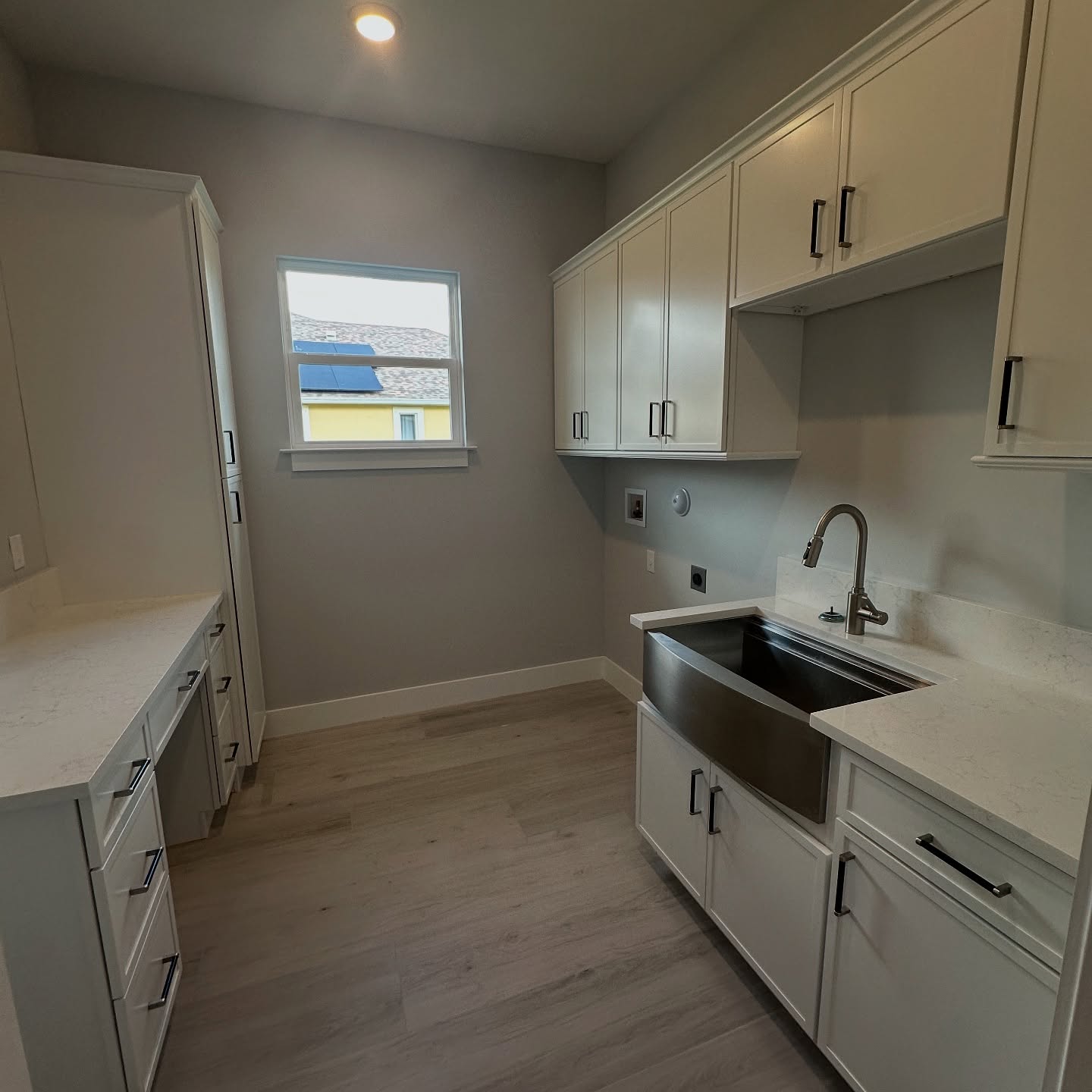 Who says laundry can’t be stylish? This roomy setup gives you plenty of space for appliances, tons of storage, and a farmhouse sink that makes the chores a little sweeter. 🏡❤️
.
.
.
.
.
#customhome #treasurecoast #treasurecoasthomes #newconstruction #construction #fortpierce #design #portsaintlucie #customcare #fl #lot #acre #realty #investment #mortgage #homeloan #newhome #hgtv #plmconstructionllc #builder #homedesign #newbuild #homesweethome #homedecor #homedecoration #reelsinsta #housereels #viralreels #explorepage #foryoupage