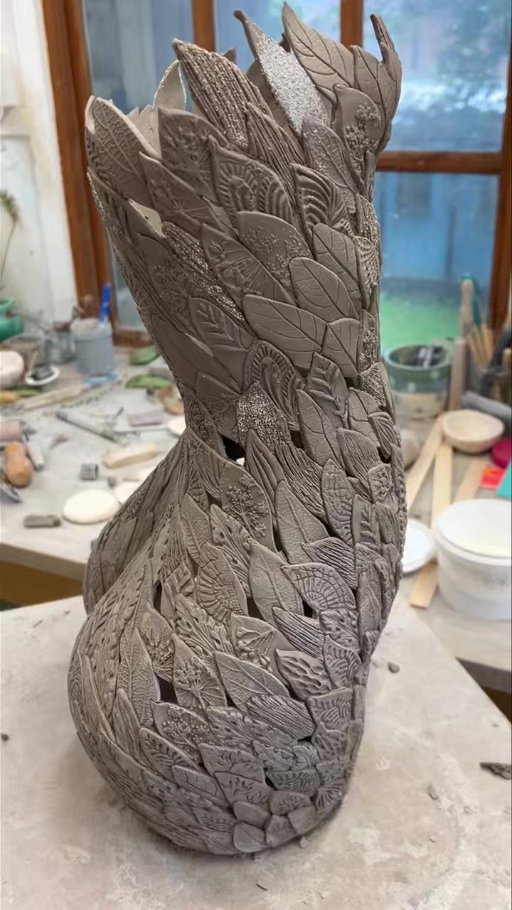 Raindrops pattering on the studio roof, a sound I haven’t heard for a good few months! But this leafy piece is nearly complete.
I have so enjoyed the process so far of making and creating this delicate clay sculpture. It’s a very methodical process and I can’t be making anything else alongside while I’m concentrating on one of these pieces. But it’s a joy to see her reaching her final day or two of the making process.
#ceramicsculpture #ceramicstudio #sculpturelovers #creativedesign #creativeprocess #creative