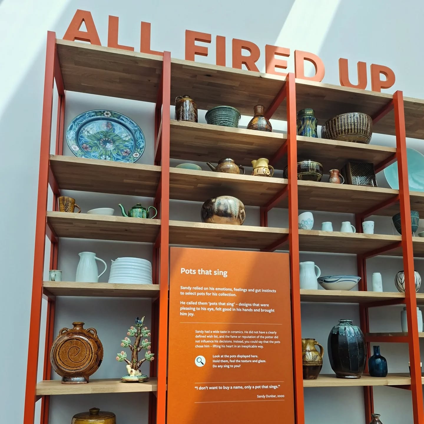 All Fired Up 🔥
We're excited to share our latest exhibition displays for Aberdeen Art Gallery with over 400 beautiful ceramic pieces now on open display.
When we first got the brief, we honestly thought it was a test, everything had to be accessible and touchable. Cue flashbacks to THAT episode of Changing Rooms... 👀 (If you know, you know.)
But then we saw the collection being unpacked by lead curator Morna and it all made sense. There’s something powerful about holding these pieces in your hands - it connects you directly to the collection and each maker.
Inspired by the potters' studios Sandy Dunbar visited to curate the collection, the final design uses honest materials of warm timber shelving and bright orange metalwork, set against Aberdeen’s iconic greys.
The display units are designed to imitate the curator's joy of unboxing. Plinths are a little taller to help protect the more fragile pieces from tiny hands. Interactives are low-tech and tactile with clay samples, thermal colour-changing surfaces and a 3D-printed pot that lets you explore form and colour.
Go explore - with care, carefully placing the pots back where you found them 🙈
#exhibitiondesign #ceramics #aberdeenartgallery