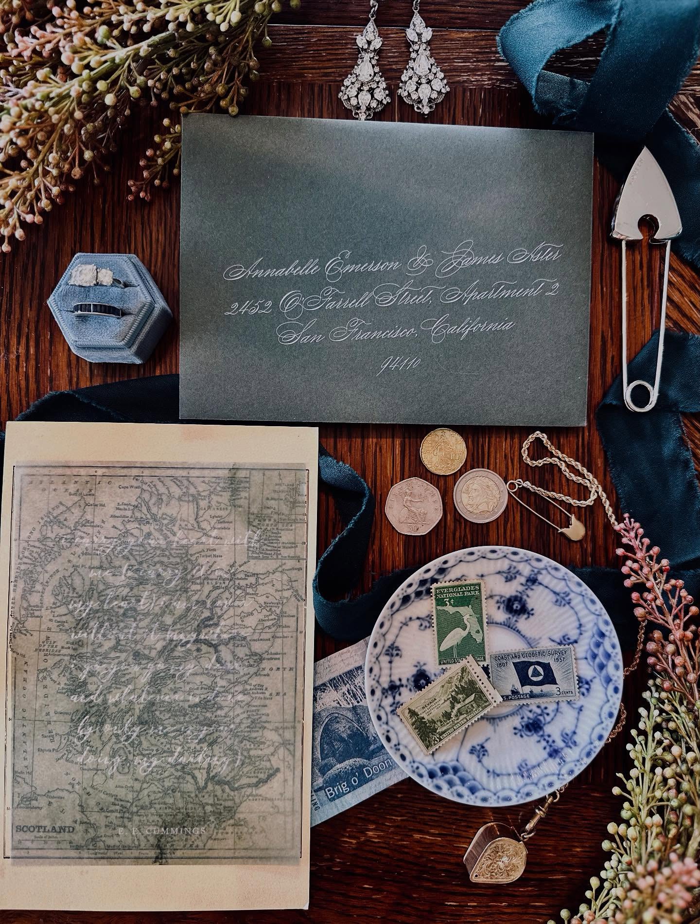 “It’s finally happening!! After more than a year of planning, we’re off to the magical Isle of Skye ✨✈️ Scotland, here we come!”
Invitation Suite: @minted
Pin: @alexandermcqueen
Flat Lay Styling: @katietaylorevents21