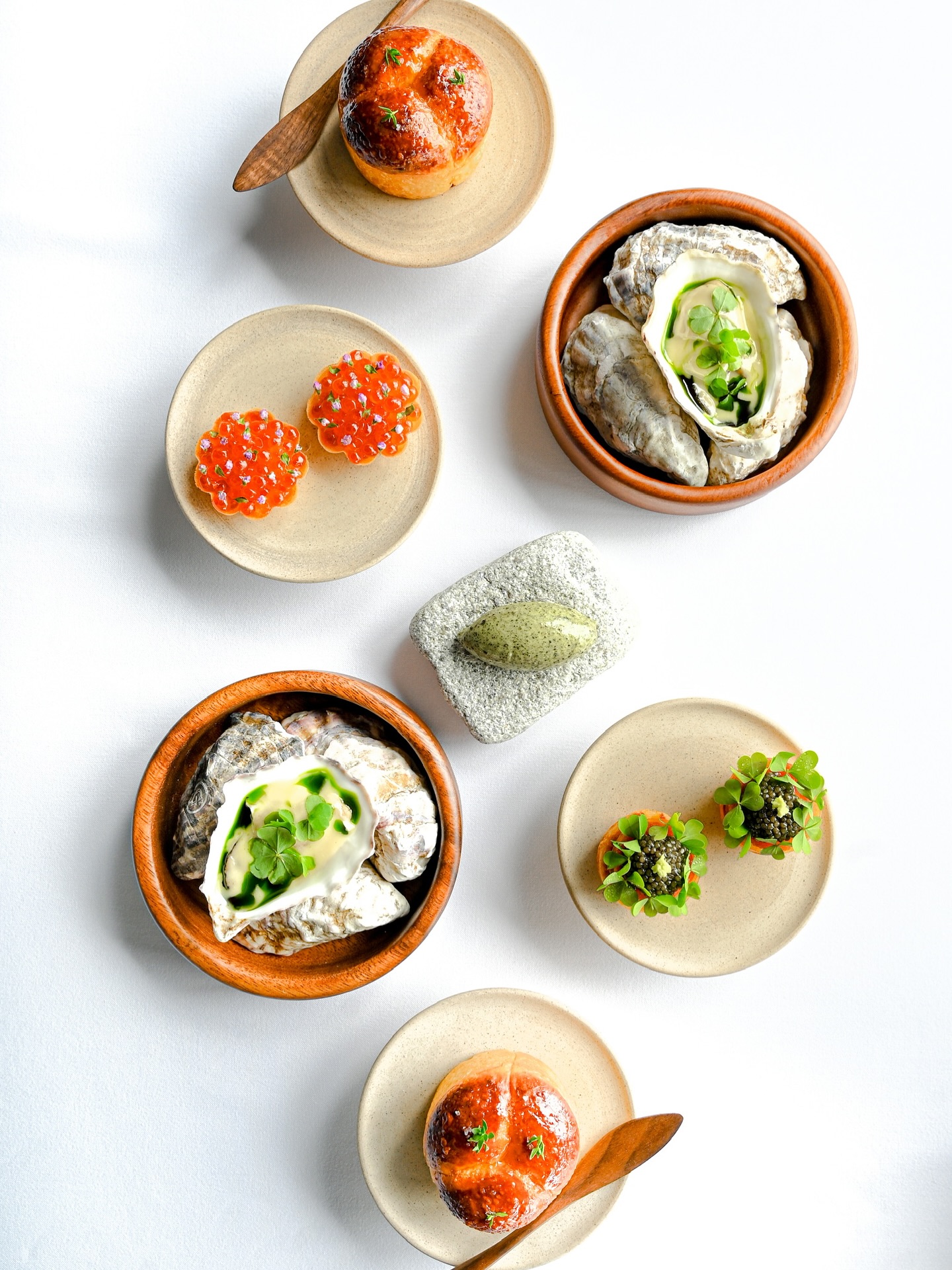 MILK BUN
Shio Kombu Butter, soft and umami-rich
BLUEFIN TUNA CHUTORO
Oscietra Caviar, Blini — the perfect harmony of ocean luxury
BROWN CRAB TART
Crowned with Ikura, a briny burst of flavor
GILLARDEAU OYSTER
Freshly shucked with Dill & Beurre Blanc, a refined seaside classic
✨ A curated journey of bites that embody the elegance of the sea exclusively at L’Arôme by the Sea. 🌊