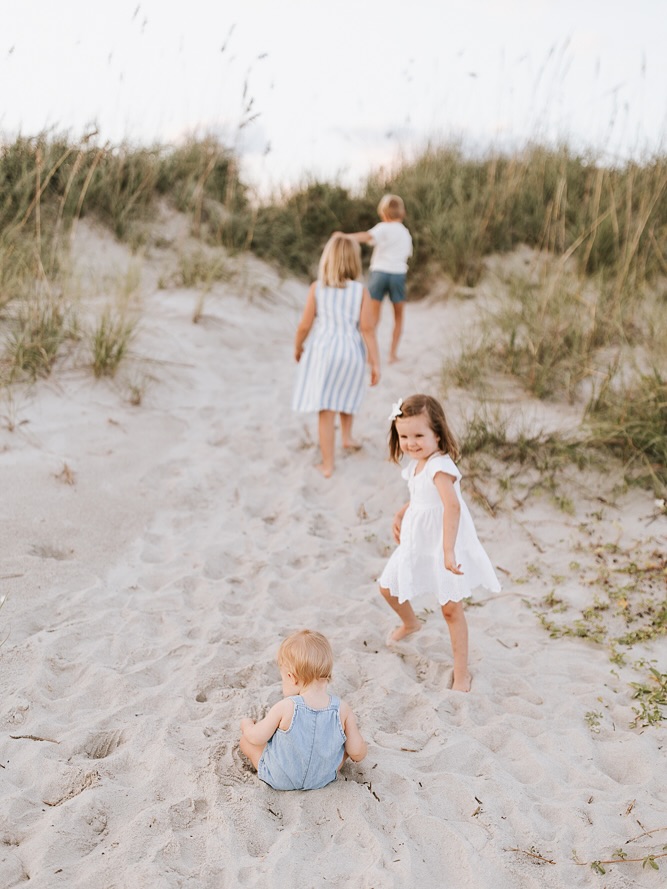 In less than one month our little Sullivan will be one year old. I still can’t believe that it has flown by so fast. I have been very initial to slow down and enjoy each of the passing months of the first year with him and it has still slipped by. I had to snap a few photos of him with the kiddos while we were at the beach recently! I am sure you will see some more photos of him as we approach his birthday. Each milestone is for sure bittersweet!