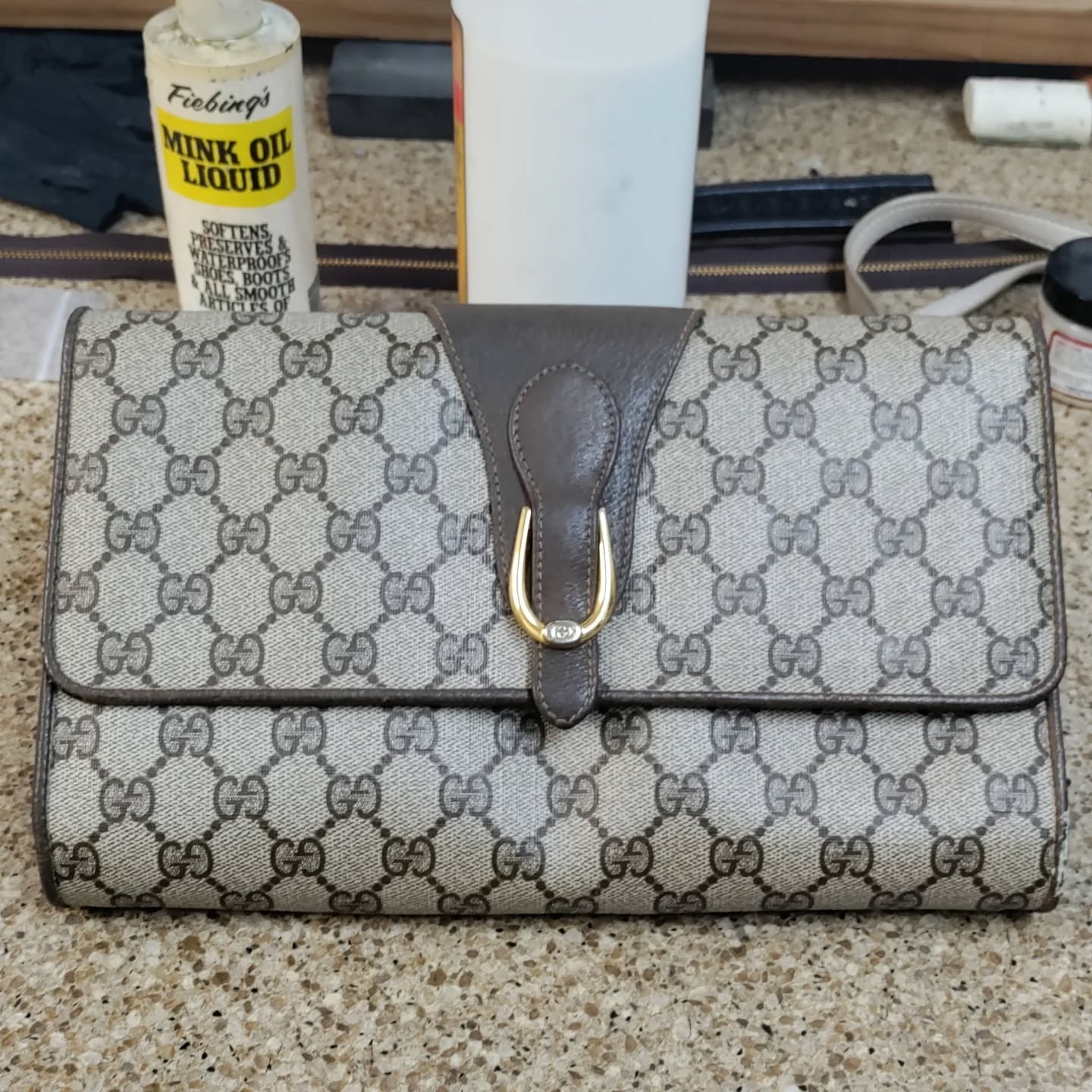 Customer brought in this Gucci Shoulder Bag for repair and cleaning. The piping was torn open on bottom corner and roughed up in spots. I've filled and repaired tear and smoothed out scuffs. Next is leather pigment to match color. #handbagrepair #handbag #gucci #guccibag