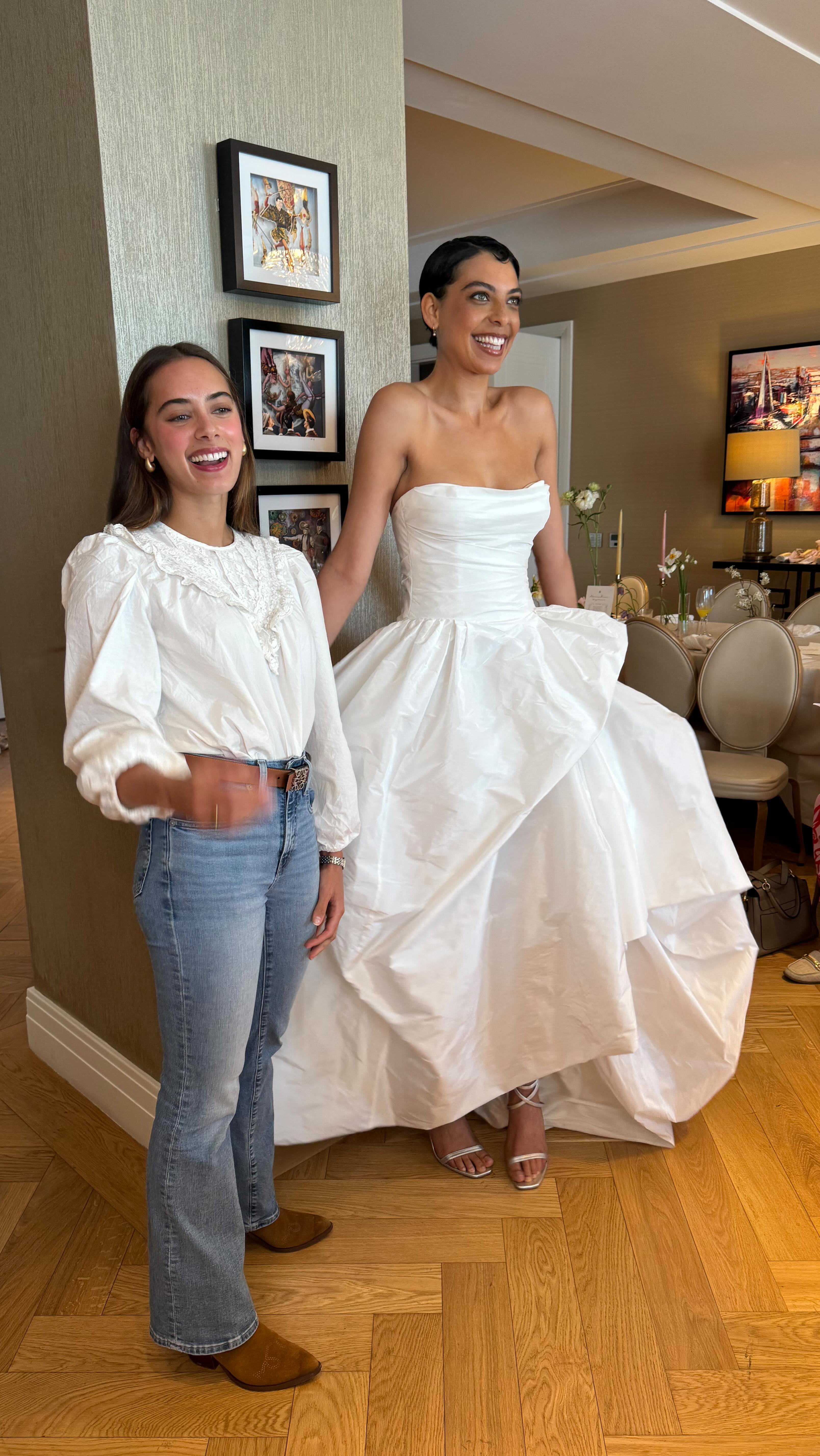 The moment @ambardriscoll got to see her wedding dress ‘Ambar’ recreated for @savannahmillerbridal 2026 bridal collection. The most fun, lightweight, versatile dress, bustle up and down to create different shapes and silhouettes. Brides you will adore this dress! Now in store and ready to try on. Hop over to our page and book your bridal appointment! #surreybridalboutique #mayandgracebridal #modernbride #surreybride #bridetobe #weddingsinsurrey #coolbride #hampshirebridalboutique #2026bride #ballgownweddingdress #contemporarybride
