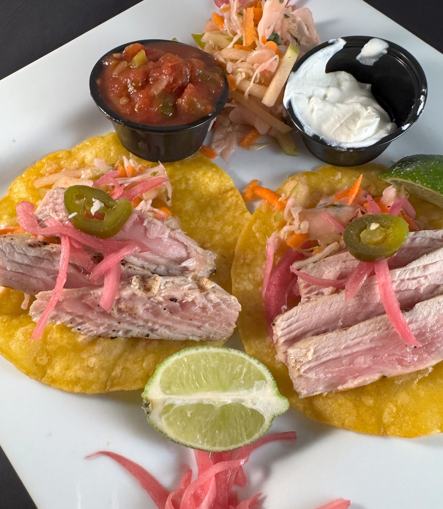 Summer may be coming to an end shortly but there is still time to get your taco fix. These Ahi tacos are cooked to perfection and have a crisp fresh slaw.