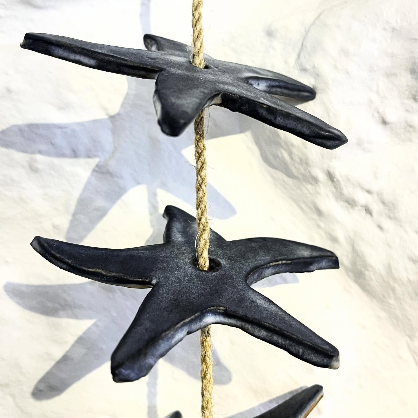 I made these ceramic starfish with a dark grey matt glaze to complement the slate we have around the cottage….then hung 8 of them on a rope. Special mention to @turn_and_fire for the inspiration!
#figgycottage #figgycottagestives #happystaysbythesea #handmadeceramics #itsthelittlethings #cornishcottage #beachcottage #coastaldecor