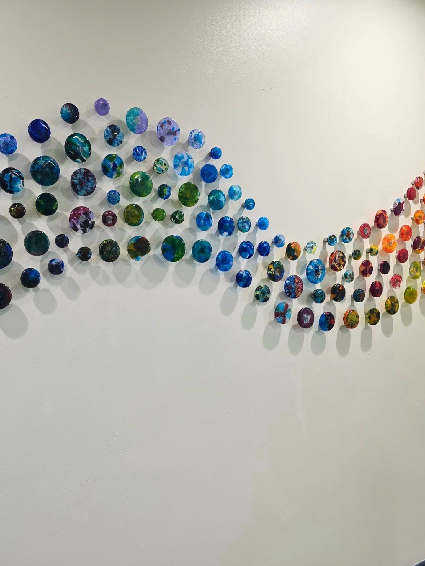 It's the start of a very exciting week for me - The Ripple Effect install week!
This is the culmination of a huge project that I've been working on, alongside the Organ Donation Team at @nhsgrampian with the aim of creating a memorial piece to honour Organ Donors within Aberdeen Royal Infirmary.
Over the past year we've led workshops at Secondary Schools across the area to share information about Organ Donation, and to create small fused glass pieces to include in the artwork. All of these pieces will now be brought together to form a large "Ripple" installation, in the entrance foyer of Accident and Emergency.
The Ripple reflects how one act of organ donation creates ripples of hope, remembrance, and new life that spread outward to touch countless others.
To give you an idea of what the final piece might look like, here's one of the mini versions which I recently installed at Kemnay Academy; I'll be installing a mini "Ripple" in each of the schools involved too ❤️