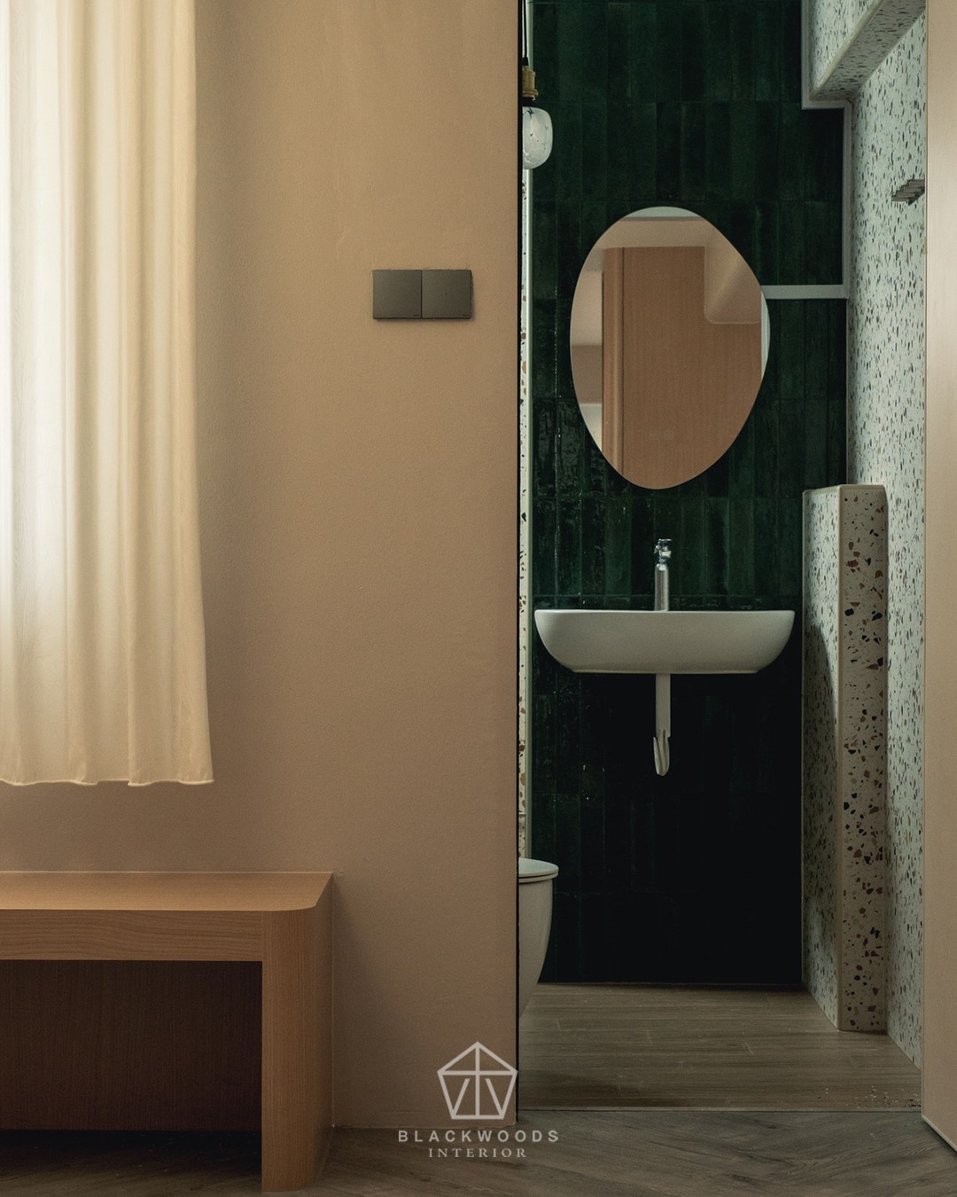 Soft curtains and light wood meet deep green tiles and terrazzo textures—an interplay of calm and character in one frame.
Would you style your bathroom with bold
tones or keep it soft and neutral?
#blackwoods #blackwoodsinterior
#interiordesignsg #singaporehomes
#quietluxury #modernminimalist
#contemporaryinteriors #neutralpalette
#designinspo