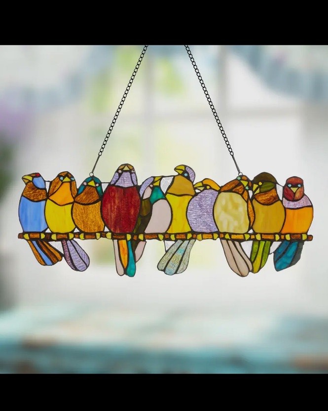 This is by far the most popular stained glass piece we’ve ever had! just a row of friendly little birds sitting on a branch. It’s about 20 inches long easy to hang and a lovely piece. # birds # stainedglassbirds #windowart #middlebury # mainstreetshop #vermontiftshop