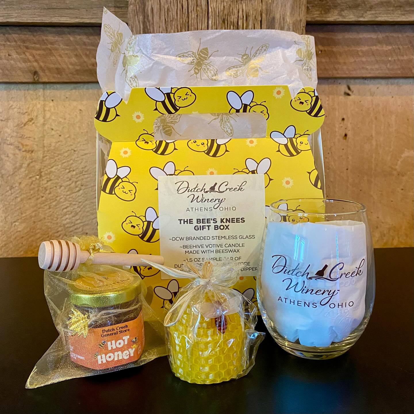 Sweeten up your sips and light up your life with our new Bee’s Knees gift box! 🐝
It’s the perfect treat, featuring a DCW branded wine glass for your favorite honey wine, a 1.5 oz jar of our house-made hot honey to add a little buzz to your bites, and a charming beeswax votive candle to set the mood.
Whether you’re treating yourself or gifting a friend, it’s the bee’s knees! Pair it with your favorite @dutchcreekwinery honey wine for the perfect gift.
#giftbox #ouohyeah #614drinks #OhioFindItHere #amesvilleohio #ohiowineries #mead #cbusfoodscene #614eats #columbus #ohiouniversity #columbusfoodie #athensohio #hardcider #honeywine #columbuseats #windy9 #fruitwine #athenscountyohio #visitathensohio #ohiowine #eatdrinkohio #ohiofoodie #Hockinghills #pizzaandbeer #614now #dutchcreekwinery #DCW #visitathenscountyohio