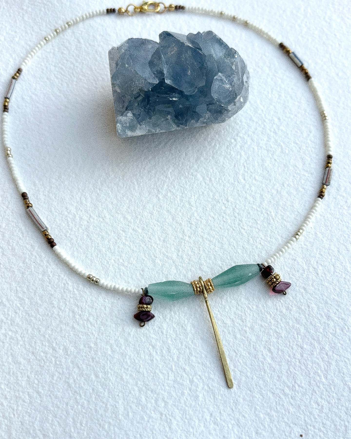 Damla Necklace
A bridge between the sky and the memory of the earth.
At the center of the necklace rests a delicate drop-shaped piece, a symbol of purity and the flowing life. Its name, Damla, in Turkish means “drop”. This necklace is like a drop that falls from the sky, reaching our earth to nurture and bring life.
The moment suspended in time, the essence that nourishes and transforms.
The Damla necklace is adorned with Roman glass beads over 2,000 years old, jewels that have traveled through centuries to reach your hands ✨
#jewels #jewelry #jewellery #ancientjewellery #ancientroman #ancientgreece #handmadejewelry #womengifts #womeninspiringwomen #etsy #etsyseller #etsyshop #egyptianjewelry #yogalife #yogagirl #yoginisofinstagram #goddess #souljewelry #spiritual #consciousartist #sacredjewelry #uniquejewelrydesign #luxuryjewels #giftideas