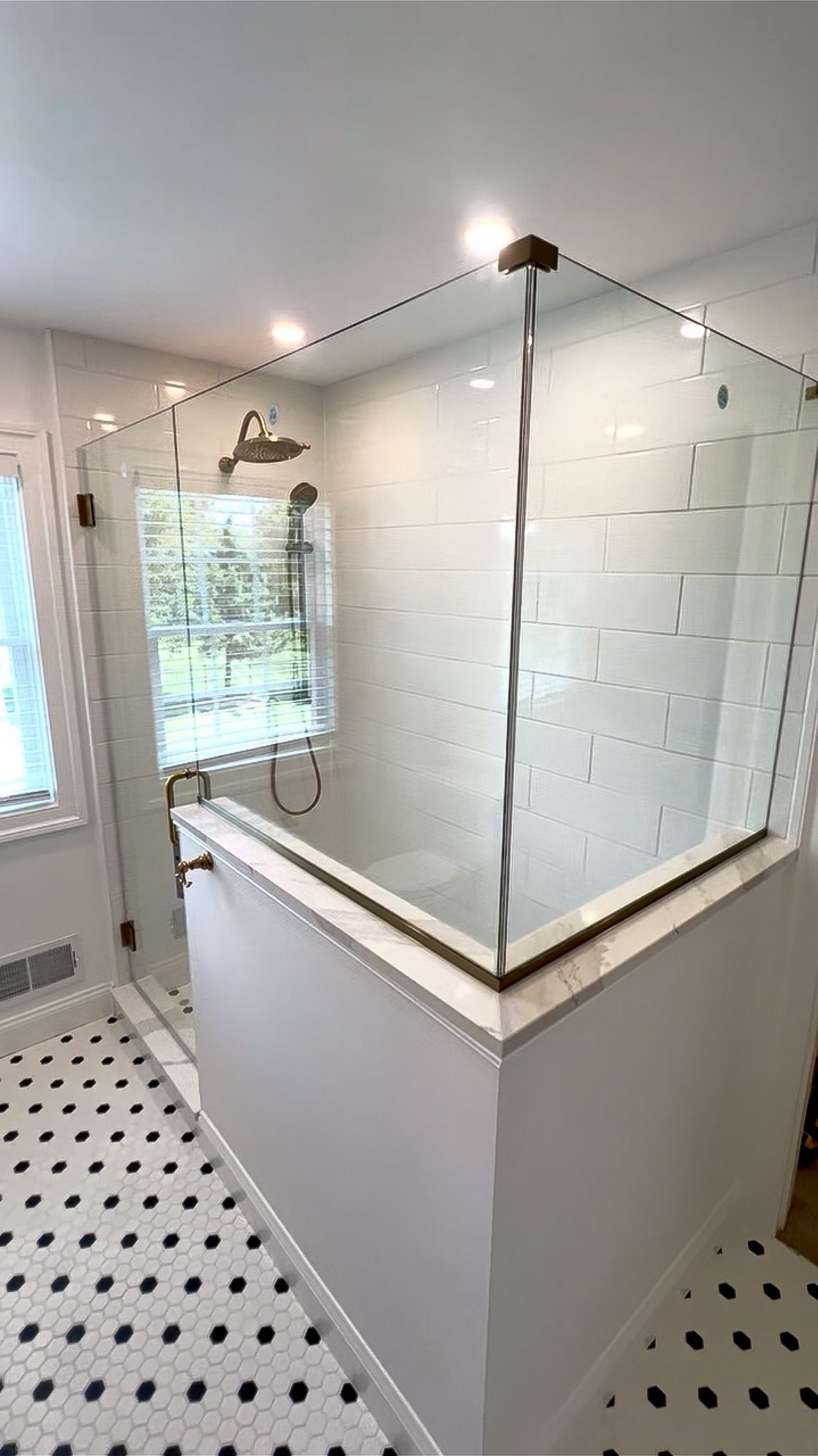 Glass and Brass in their happy place 🥰
#centralpa #bathroomdesign #framelessglass #showergoals #blissful #glassshower #glassshowerdoor #brasshardware #whitetile #homerenovationideas #homerenovation