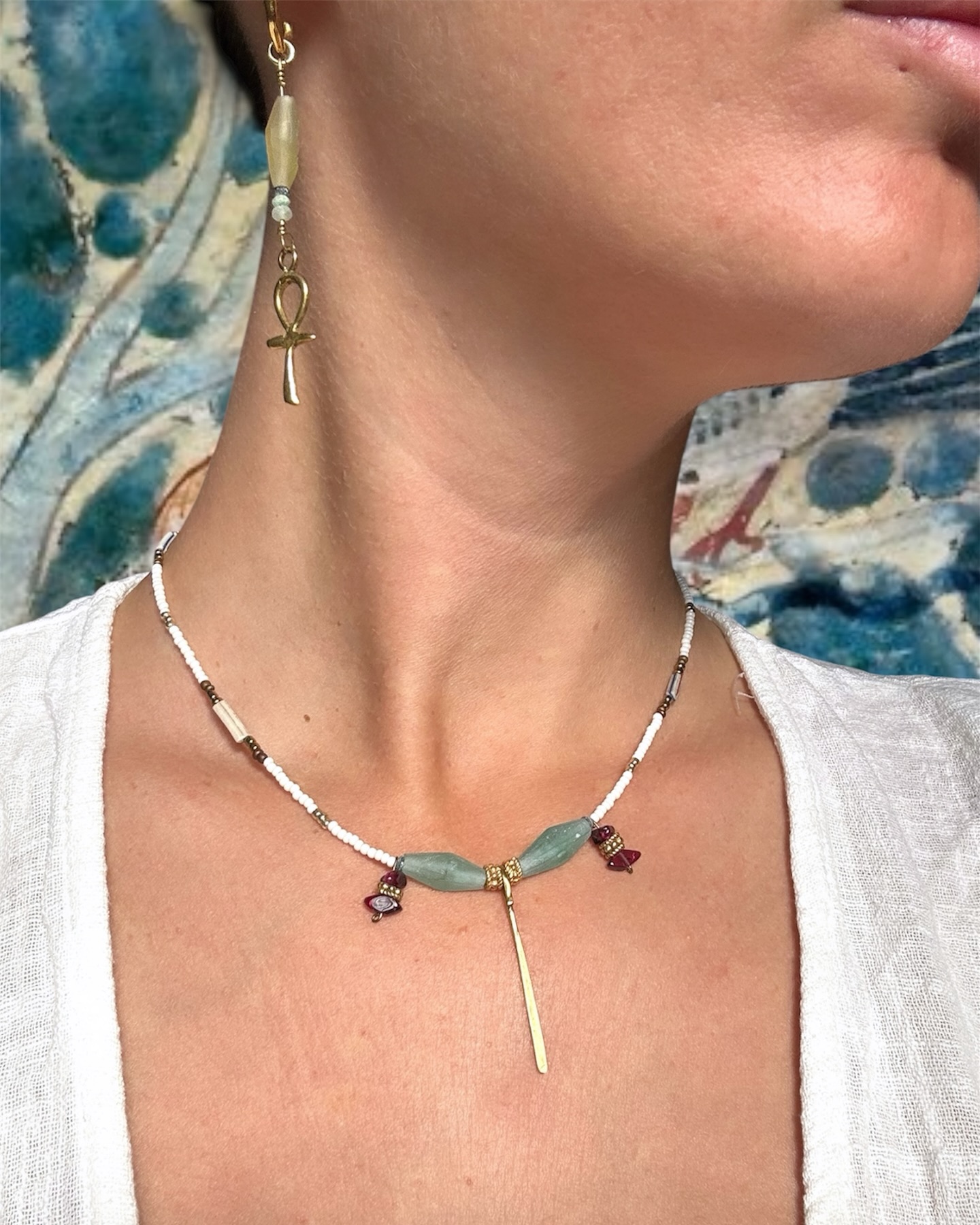 Damla Necklace & Ankh earrings with ancient Roman glass
I like to create pieces that have the history of our ancestors in them.The Damla necklace and Ankh earrings are both adorned with Roman glass beads over 2,000 years old found in the archaeological excavations in Afghanistan. Afghanistan is located on the silk road, and was formerly known as Bactrian Kingdom. Lots of goods of the Roman Empire were traded eastwards along the Silk Road and many fragments of this time period are still found in the middle east. 🧿
Jewels that have traveled through centuries to reach your hands ✨
Damla, in Turkish means “drop”. This necklace is like a drop that falls from the sky, reaching our earth to nurture and bring life.
A delicate and luminous it rest on your neck sharing with you the secrets of its history.
#jewels #jewelry #jewellery #ancientjewellery #ancientroman #ancientgreece #handmadejewelry #womengifts #womeninspiringwomen #etsy #etsyseller #etsyshop #egyptianjewelry #yogalife #yogagirl #yoginisofinstagram #goddess #souljewelry #spiritual #consciousartist #sacredjewelry #uniquejewelrydesign #luxuryjewels #giftideas