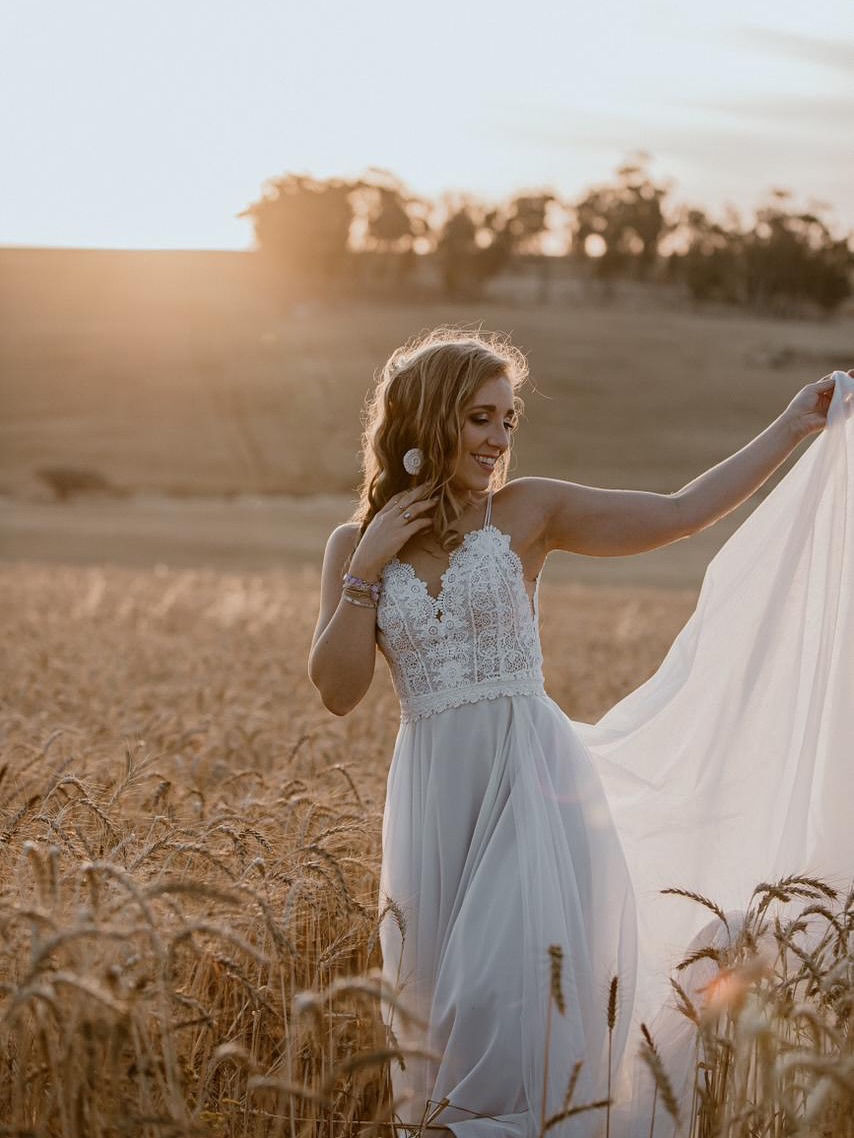 Sunshine, soil, and something borrowed🌾. #weddingdress #engaged #bridetobe #wedding #olivelli