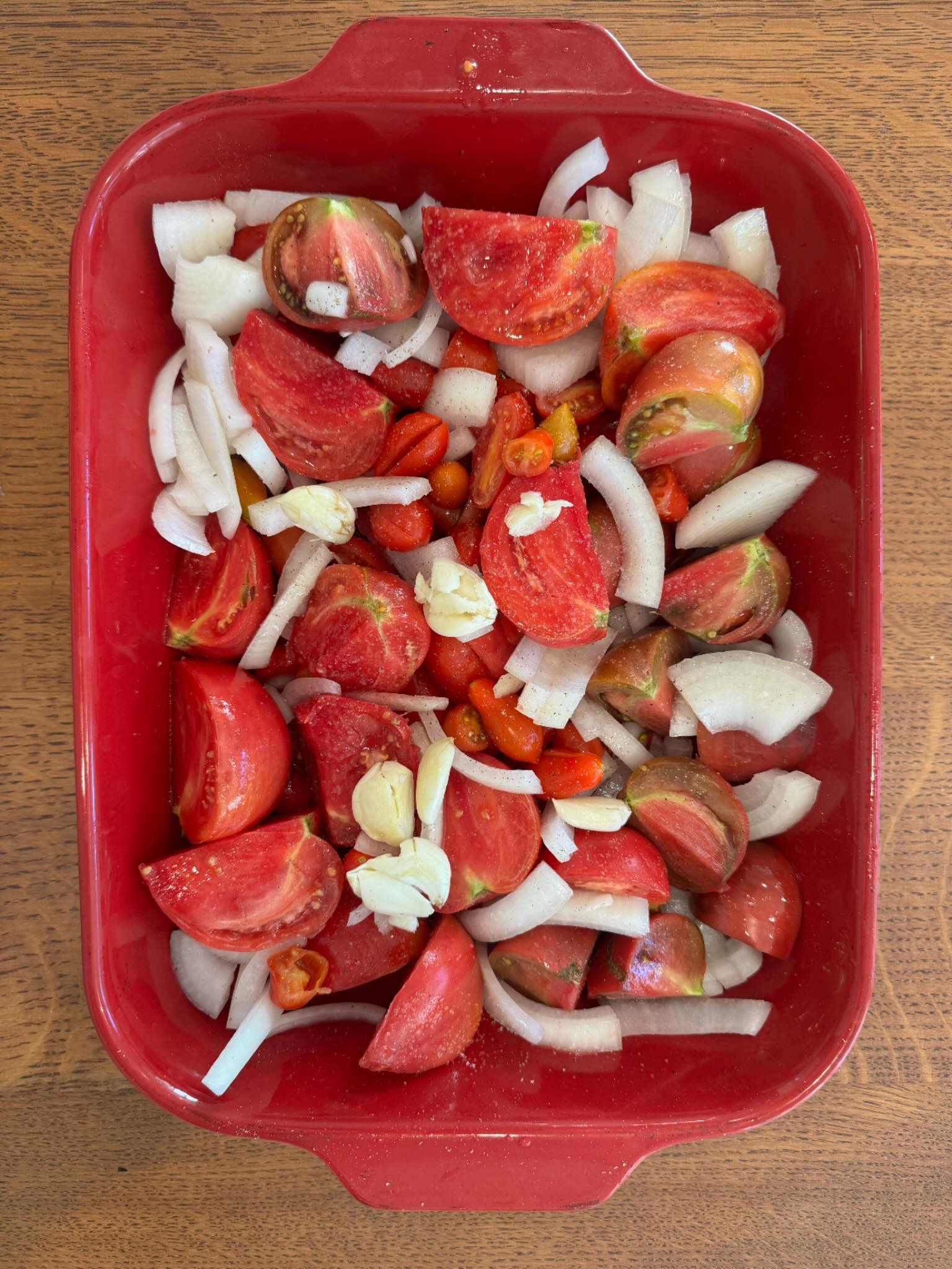 I was never a tomato soup fan until I started making roasted tomato soup with tomatoes from the garden.
Tomatoes, onion, and garlic are roasted in the over before being puréed with a little bit of broth into a delicious, thick, satisfying soup. Topped with a little basil from the garden and served up with some croutons, grilled cheese sandwiches, or toast…..it doesn’t get much better than this!
September is the perfect time to make this recipe as the weather cools a bit and the tomatoes continue to explode in the garden. Posting soon on our website at www.yardtotablemarin.com.