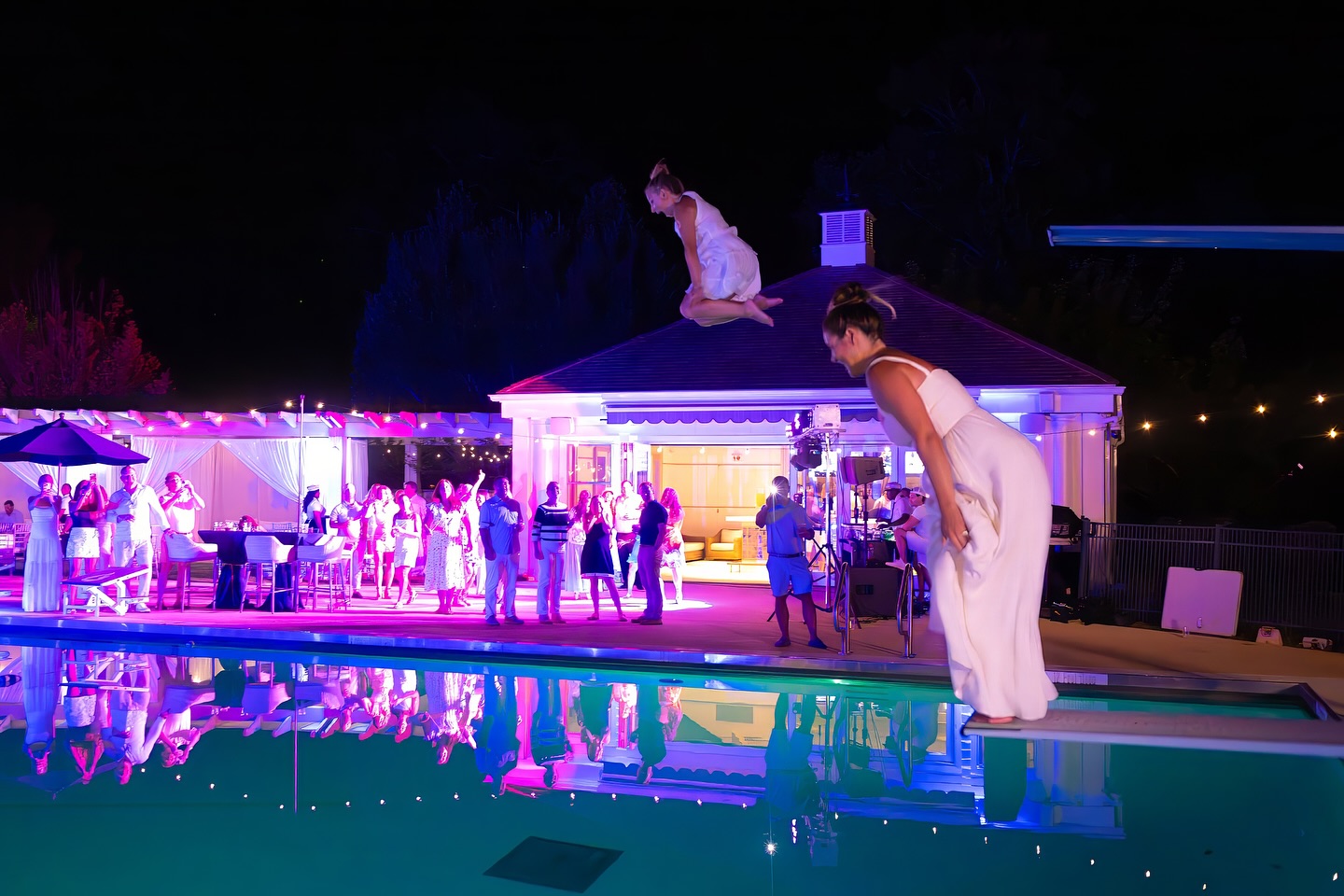 When the ladies in white dresses start flying, you know the fun has been flowing. #photographer #westchester #ct #weddingphotographer #partyphotographer