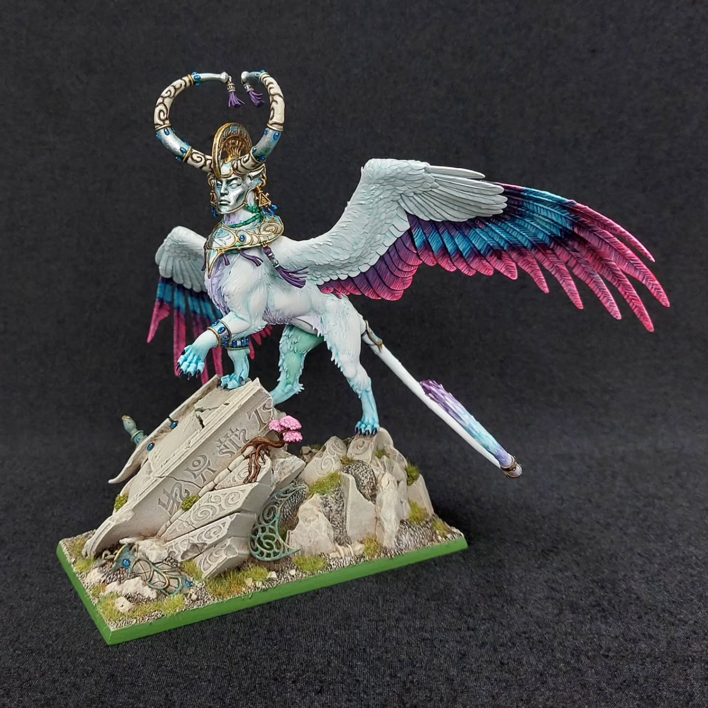 This is my first painted Sphinx for my return to painting a Warhammer Fantasy army. Though the model itself is from Age of Sigmar. Like most of my AoS purchases, it’s been repurposed into something that fits the Old World or 40k sometimes.
Why? Because I’m not simply satisfied that the Old World is “back.” In canon, the End Times still happened, and that doesn’t sit right with me. The Sphinx project is my way of ret-conning that ending. They’re ancient guardians of time itself, returning to prevent the final fall. A little creative lore to push back against Chaos.
On the hobby side, the biggest obstacle was fitting the model onto a proper fantasy base. That meant cutting down the big scenic base it came with and rebuilding the missing section with milliput.
Painting a centrepiece like this takes time, but the hardest part wasn’t the paintjob, it was holding the thing. On big models, I find the closer you can hold to the area you’re painting, the less it wobbles around. Holding a model this size by the base just doesn’t cut it. These days, I paint in sections and assemble later, but since I bought this second-hand, I didn’t have that luxury.
All in all, I’m really pleased with how it turned out. One down… and many more riddles yet to come.
#warhammerfantasy #theoldworld #warhammerfantasybattles #wfb #warhammercommunity #warhammerfantasyarmies #warhammerconversion #kitbash #tabletopminiatures #miniaturepainting #miniaturepaintingwarhammer #wargamingminiatures #oldworldproject #fantasyarmies #wargamingcommunity #sphinxarmy #convertedminiatures #paintingwarhammer #warhammerfantasylore